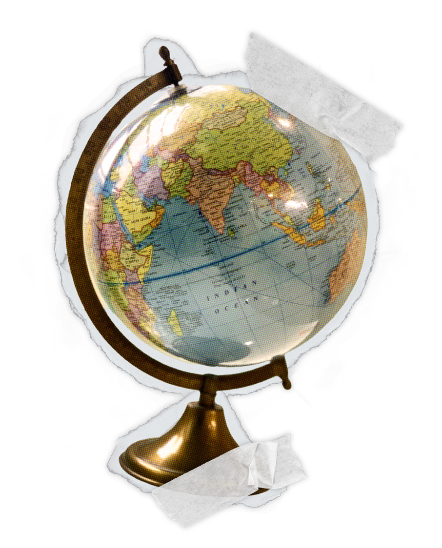 A cutout of a globe with tape on it