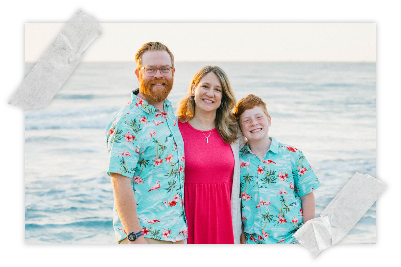 A smiling family on the beach at a past Easter Sunrise service