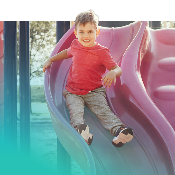 Child playing on the slide