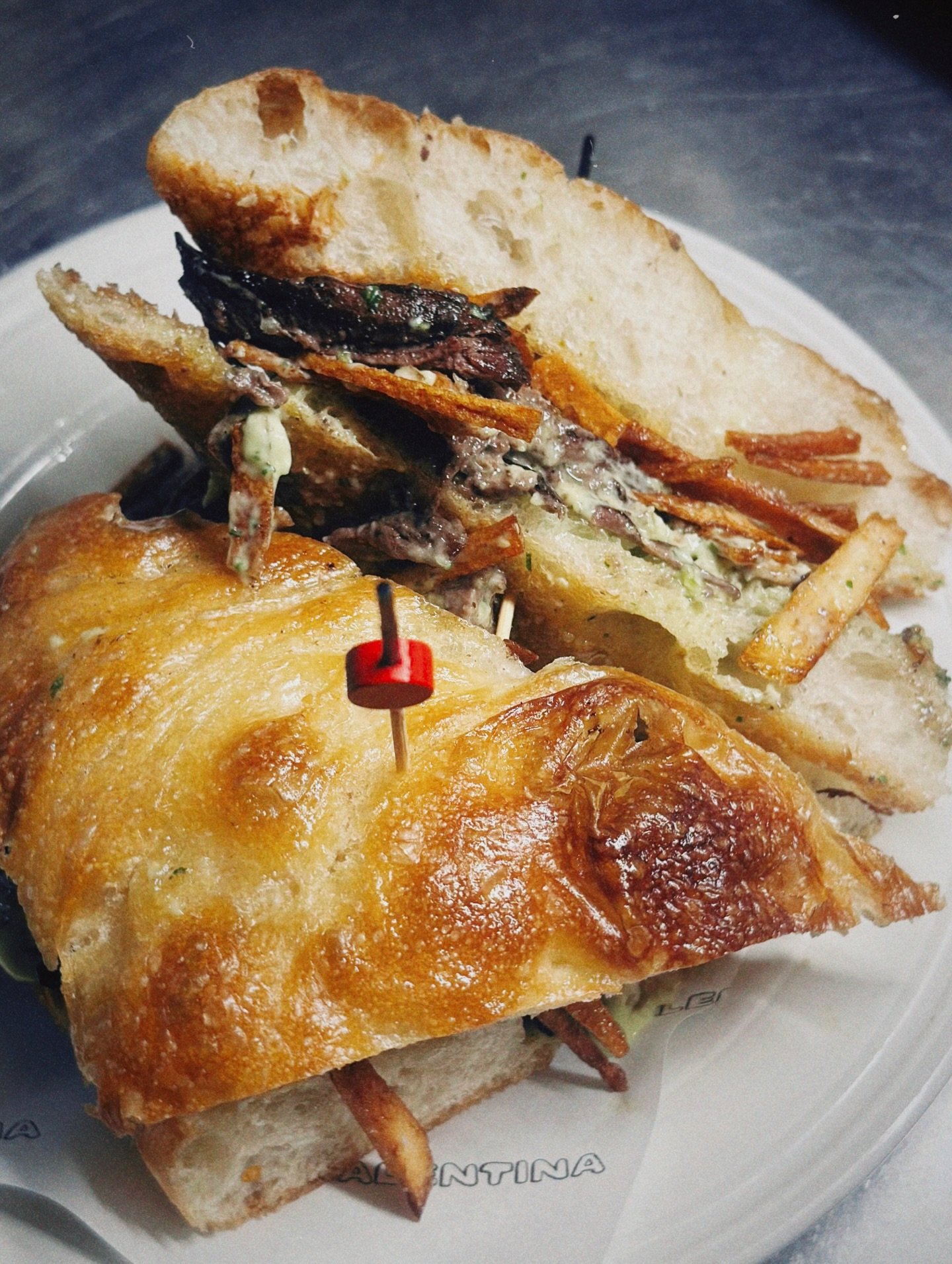 Steak Sandwich | hangar steak, avocado dill aioli, pai potato chips, focaccia 

Calamarata al Agnello | calamarata pasta, lamb, calabrian chili, bechamel

Butternut Squash Soup | butternut squash, green apple, coconut milk, focaccia