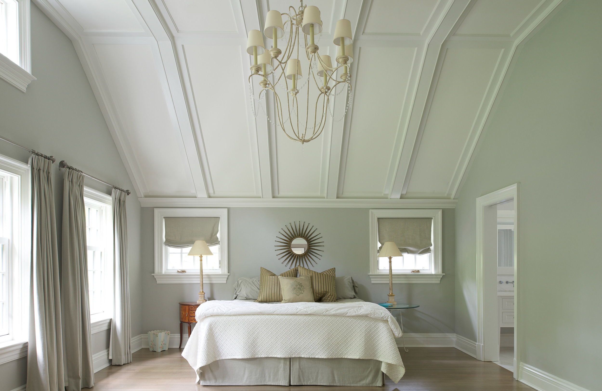 Titus Built - White Master Bedroom with Tall Ceiling and Chandelier