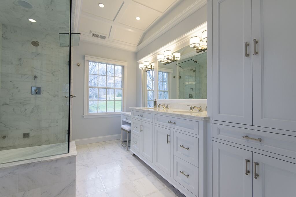 Titus Built - Marble and Glass Shower Enclosure with Custom Vanity