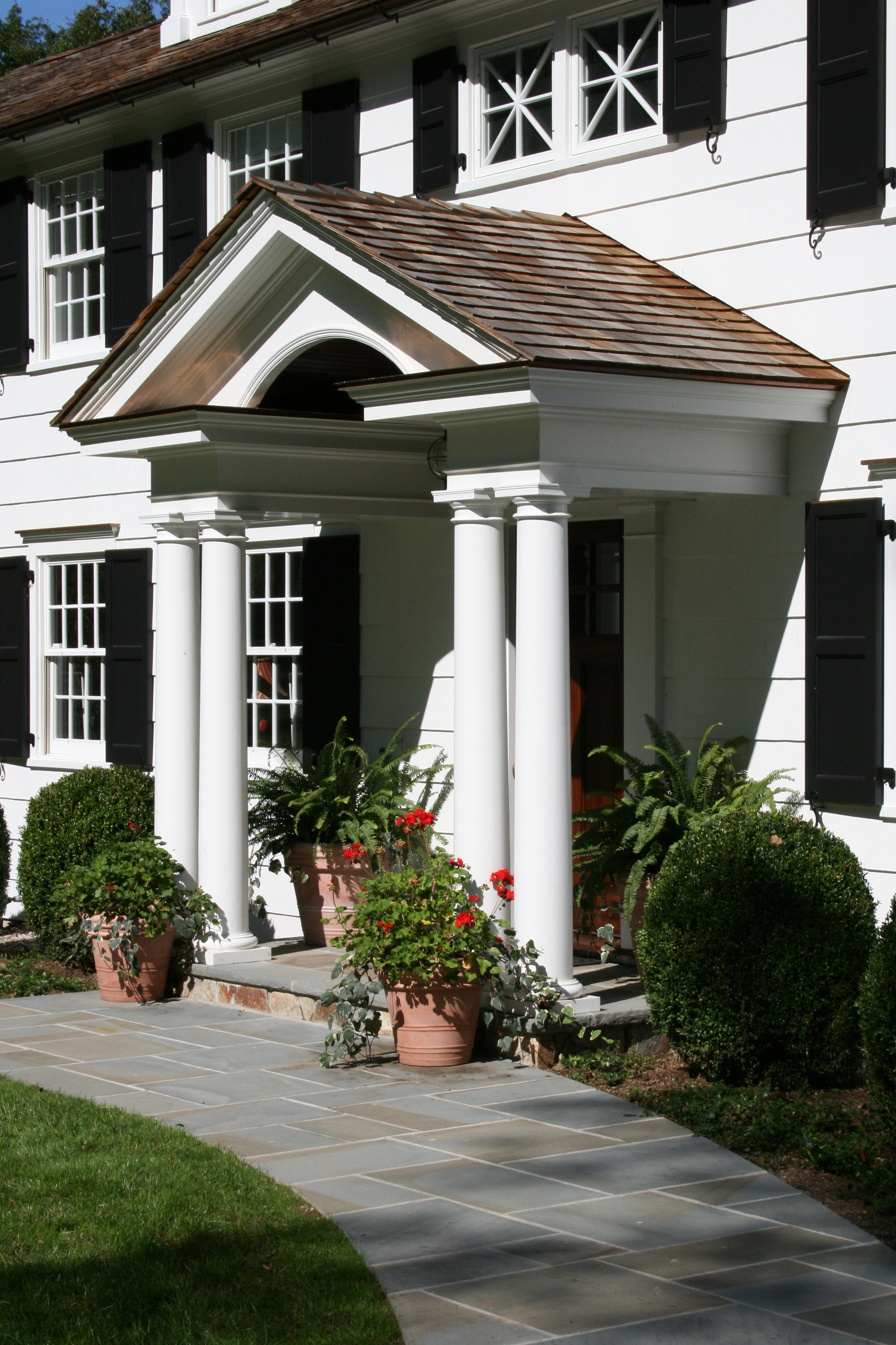 Titus Built - Stately Columns with Cedar Roofing