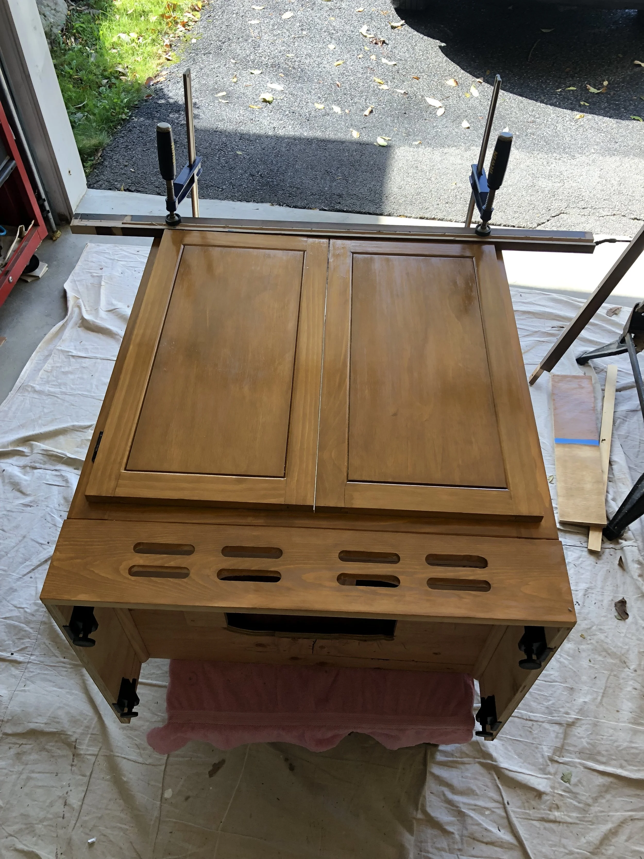 View of the kick heater vent and cabinet feet