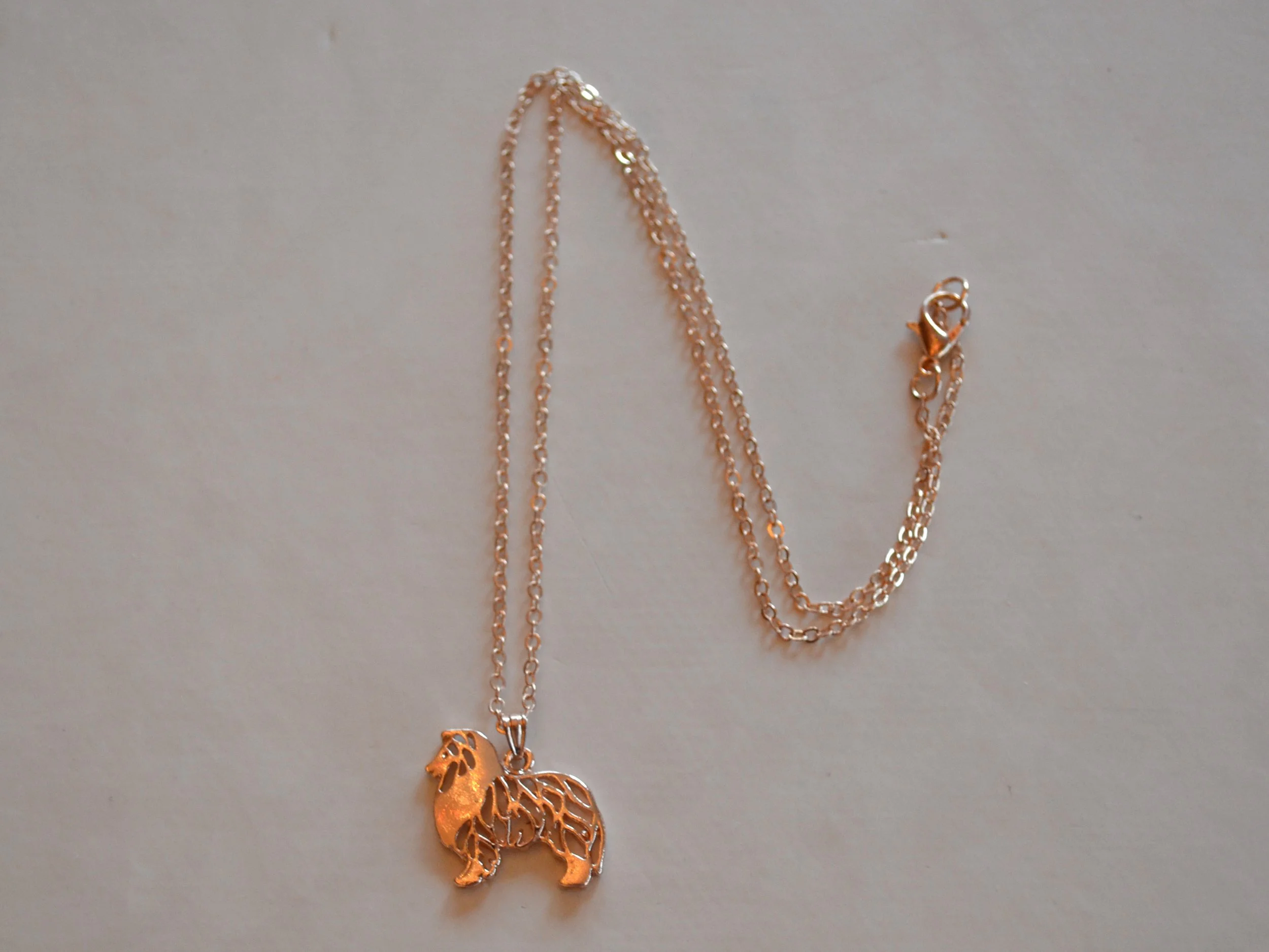 bling smykke silhuett rosegull.jpg