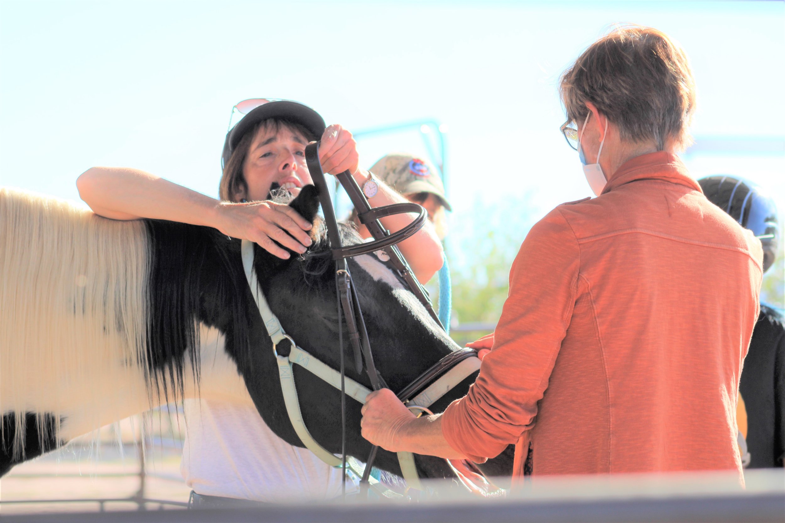 Debbie fixing Sweet Pea's halter.JPG