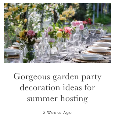 A garden-themed table setting with floral centerpieces, glassware, and plates outdoors in a lush garden.