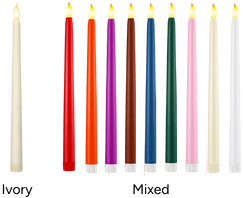 A row of colorful LED taper candles with lit flames.