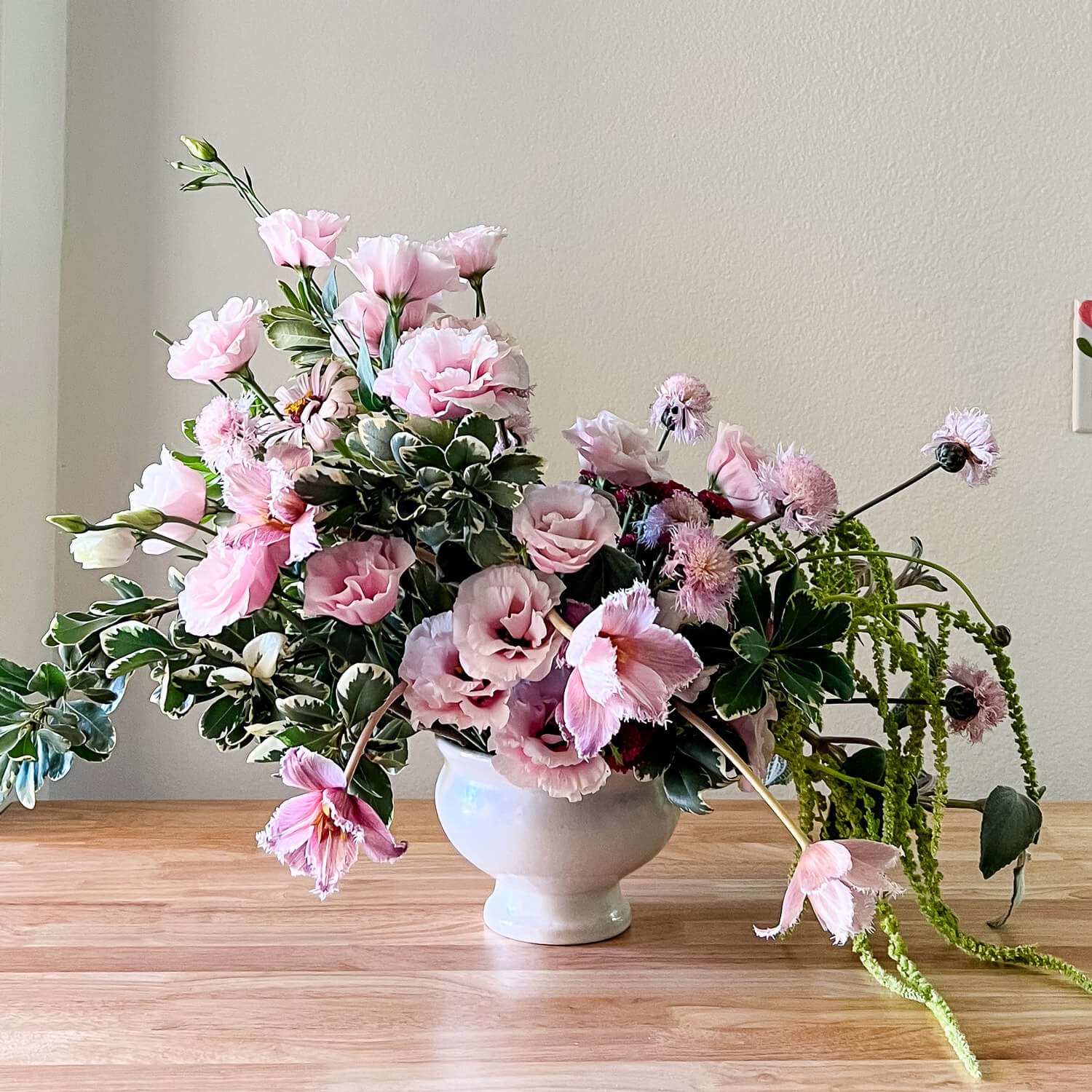 Flower delivery in Joshua Tree, featuring a sculptural desert floral arrangement in a designer vessel by Posy Laboratory.