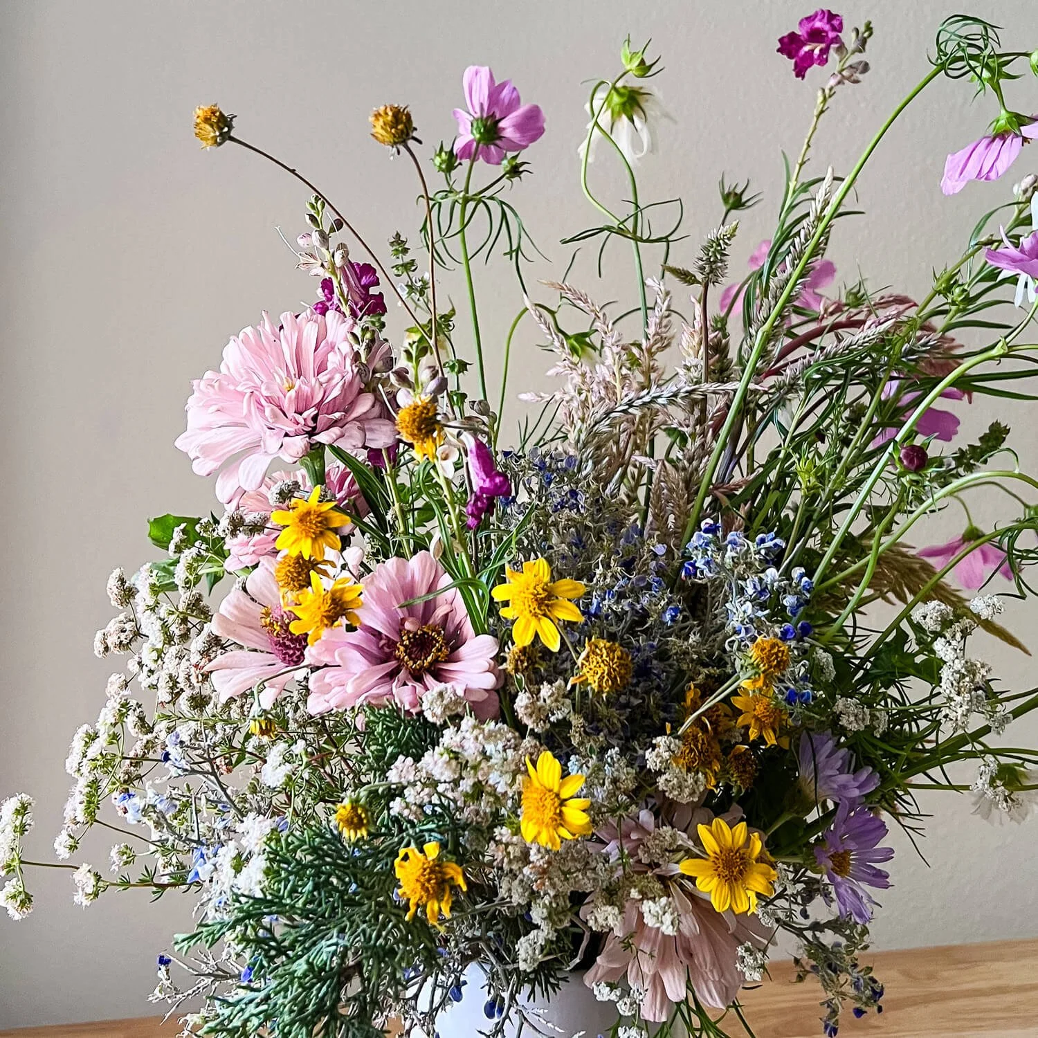Bespoke floral design in a stone vase, available for local delivery across the Joshua Tree and Pioneertown area.