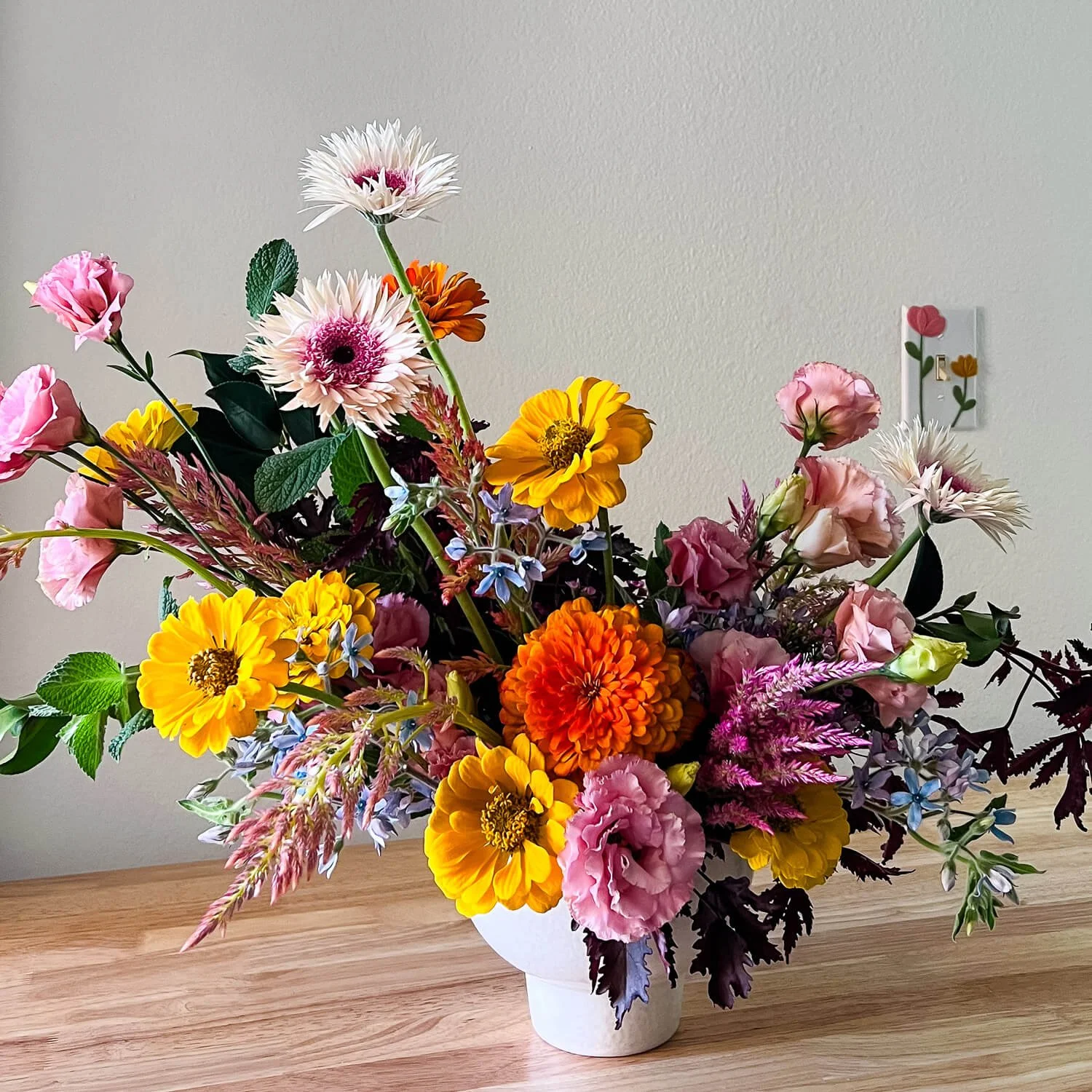 High-end floral arrangement in a designer vase, available for reliable delivery throughout the High Desert by Posy Laboratory.