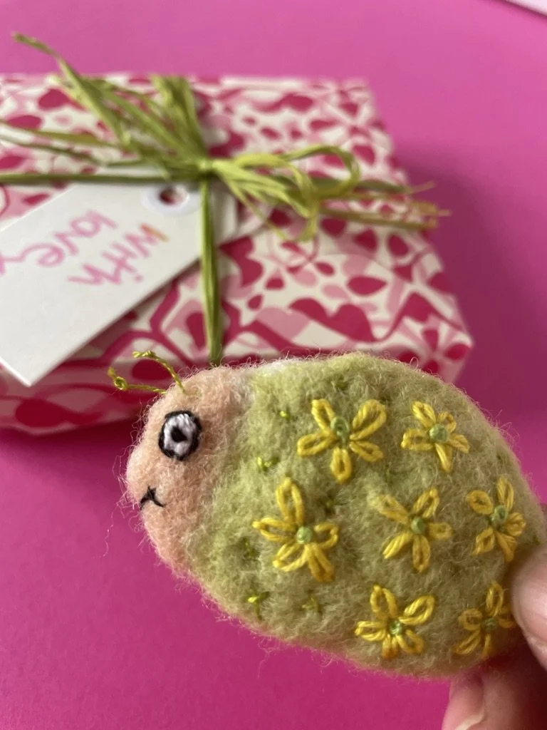 needlefelted bug brooch by Lisa Woakes.jpeg