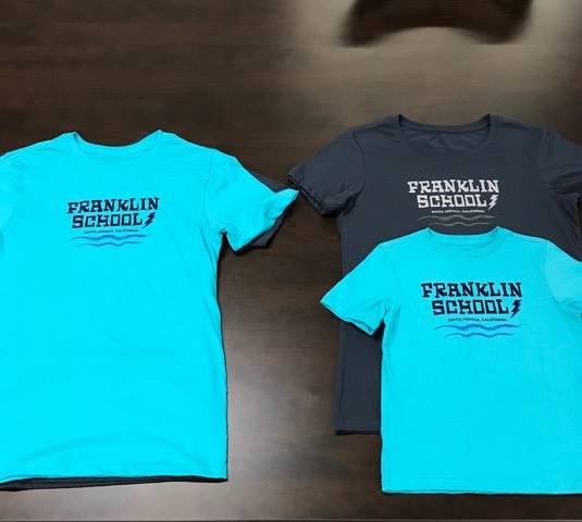 teal shirt.jpeg