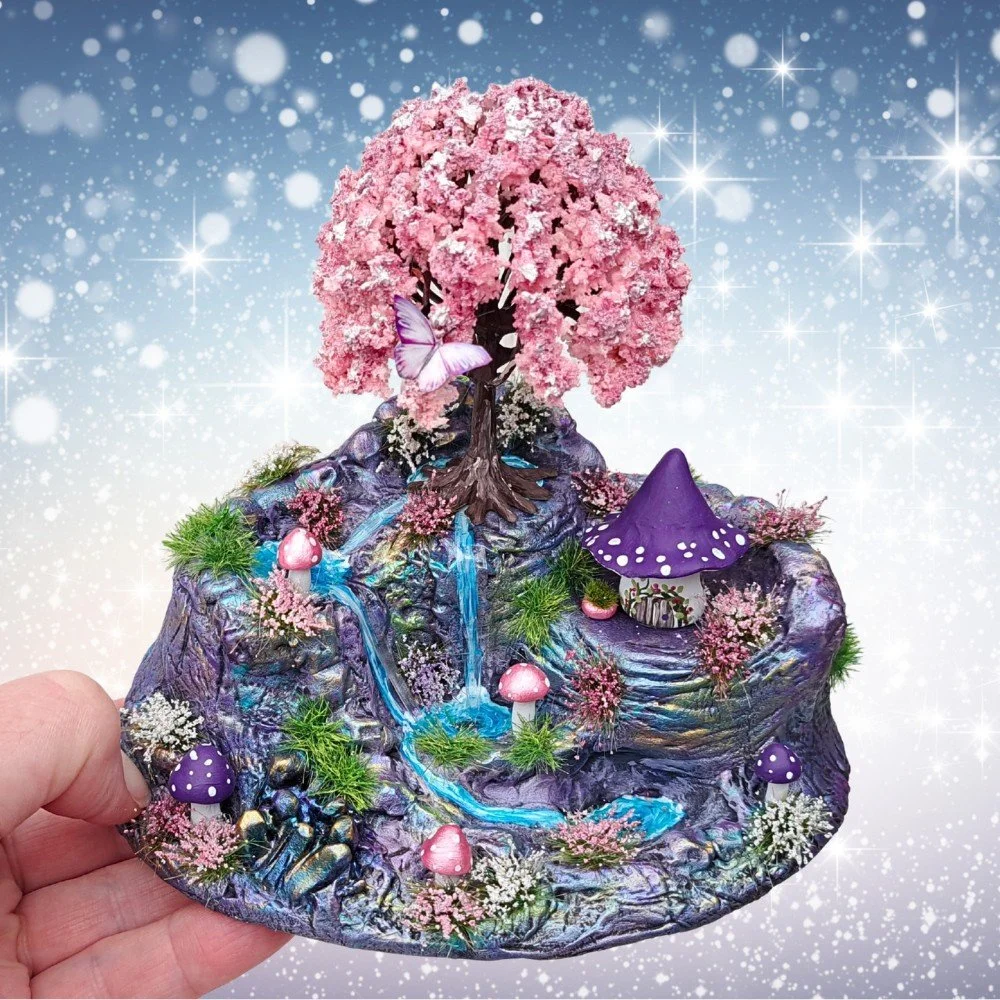 Whimsical miniature fantasy sculpture scene.jpg