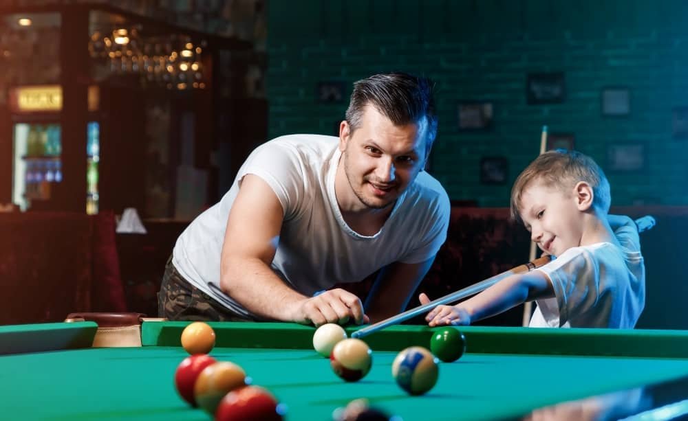 father-and-son-playing-billiards.jpg