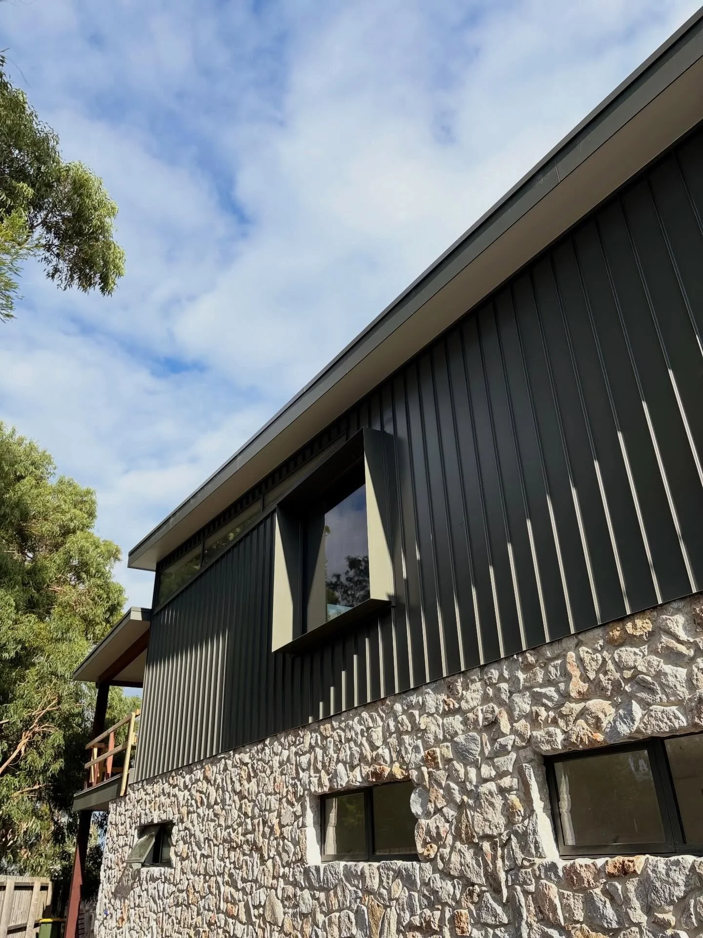 Evergreen Residence.

Taking shape in the heart of Inverloch, this coastal home is all about contrast &mdash; raw, textured stone paired with clean, contemporary lines above.

Designed to feel connected to its surroundings, the materials do the talki