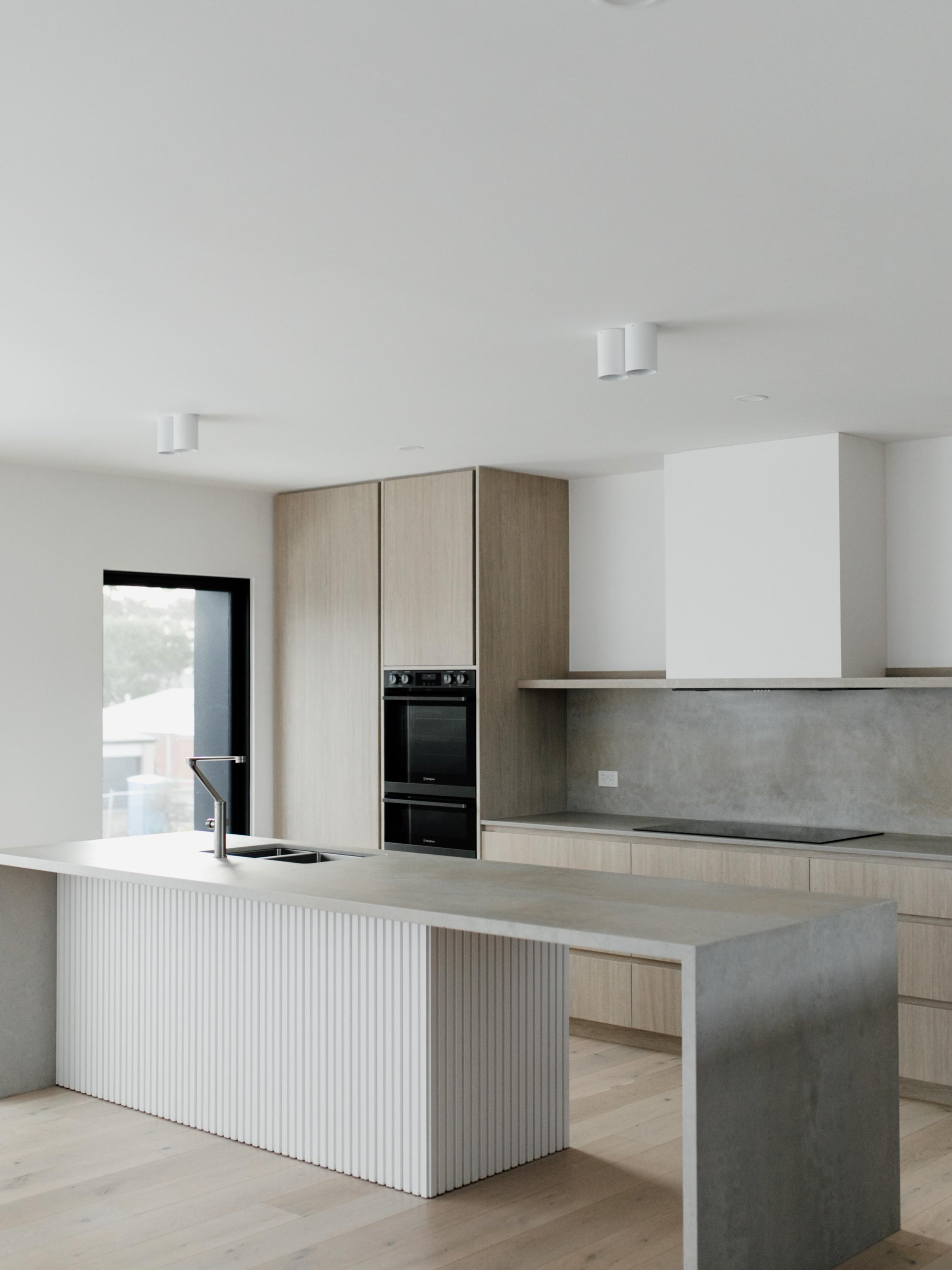 Heart of the home at The Narrows Residence.

Filled with soft light, warm textures and a calming material palette, this kitchen was one worth revisiting.