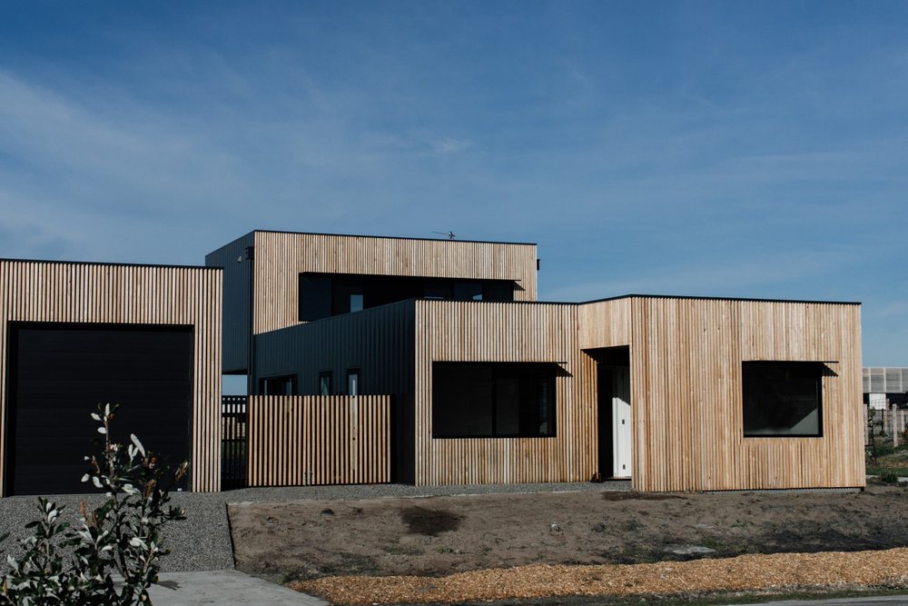 Modern sustainable home featuring radial timber framing and ColorBond steel cladding, designed for durability in Australia’s climate.