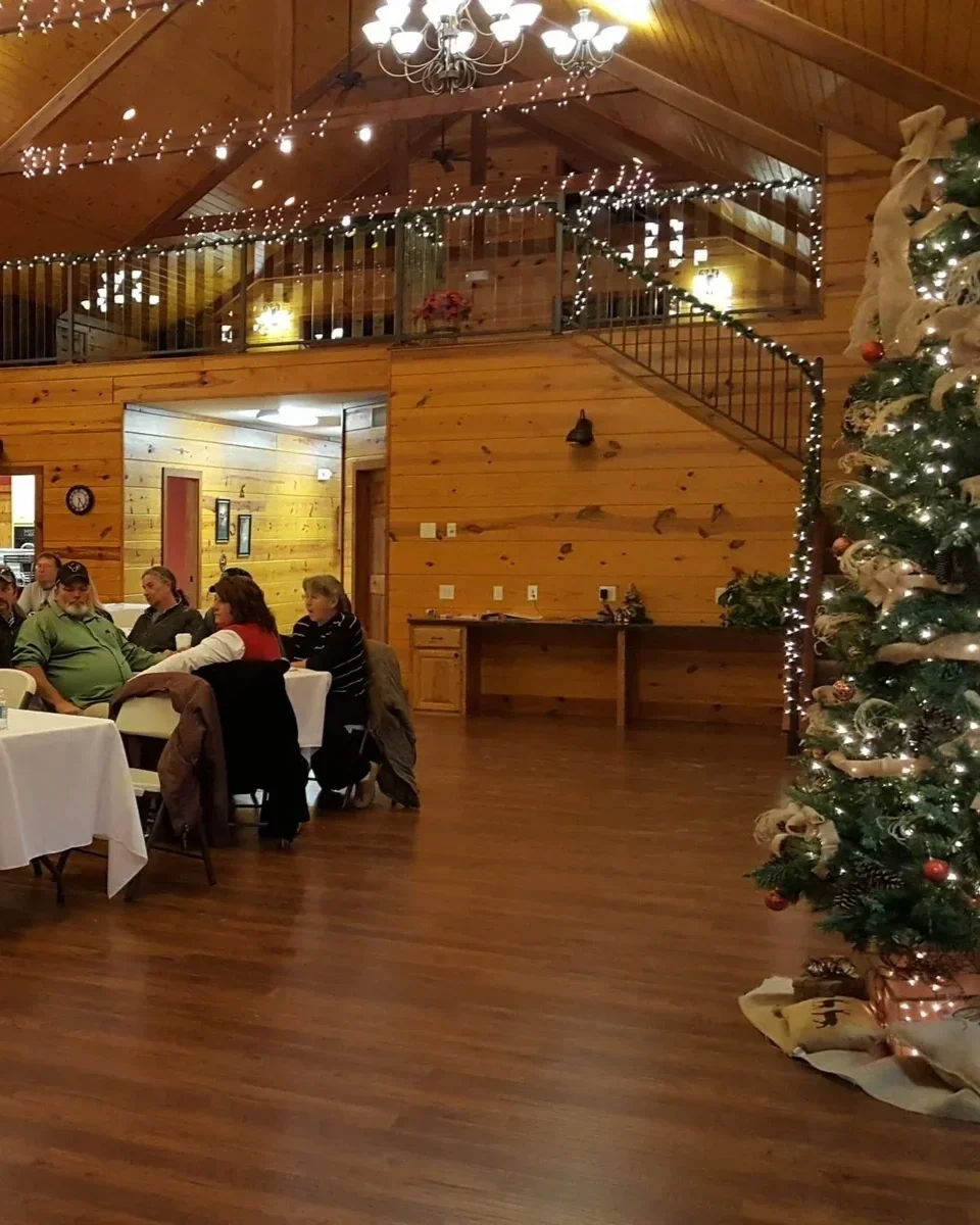 Corporate group Christmas party with banquet and decorated tree at Life's Finer Moments