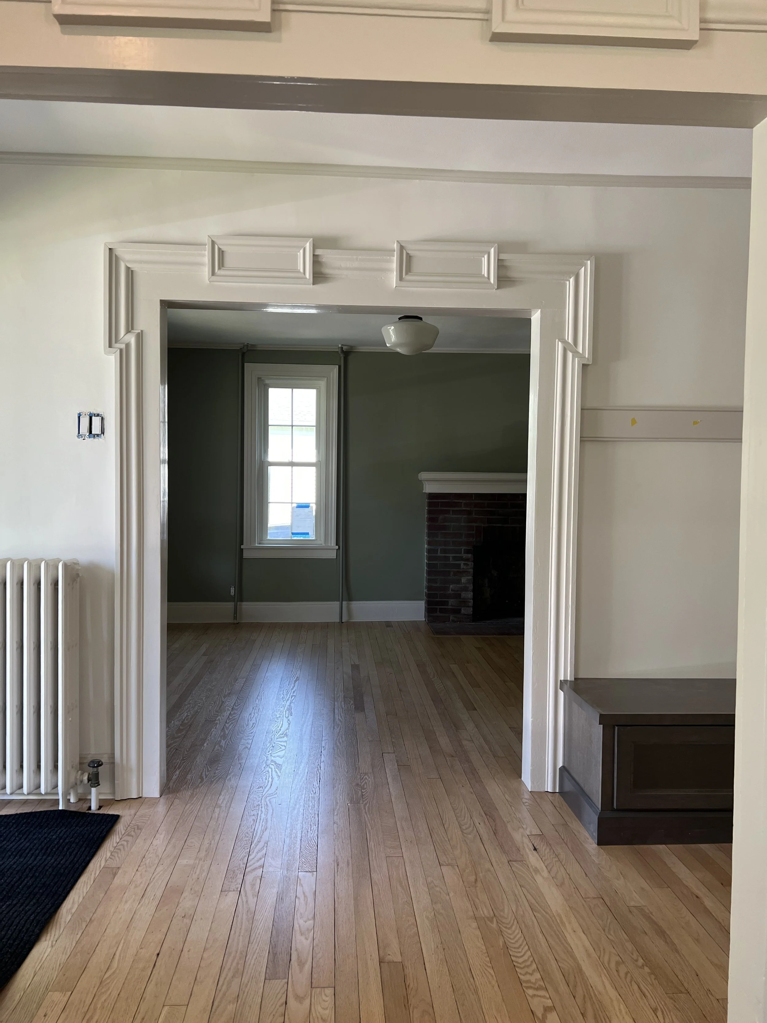This renovation on a historic Gothic Revival home in Hamilton, New York is in progress. Complete with custom millwork, refinished floors and updated finishes throughout.