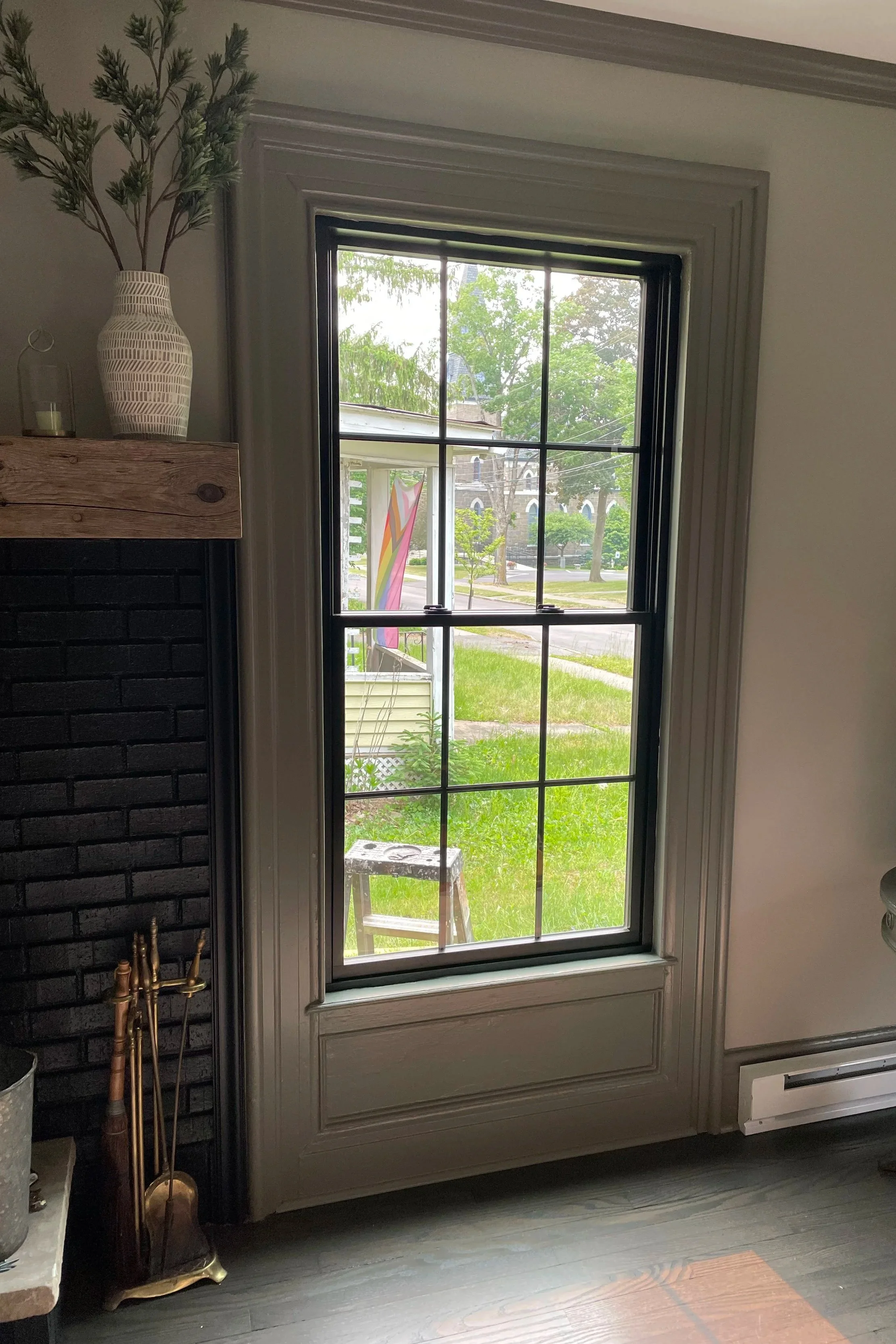 A wood replacement window installed by a general contractor in a home located in Hamilton, New York.