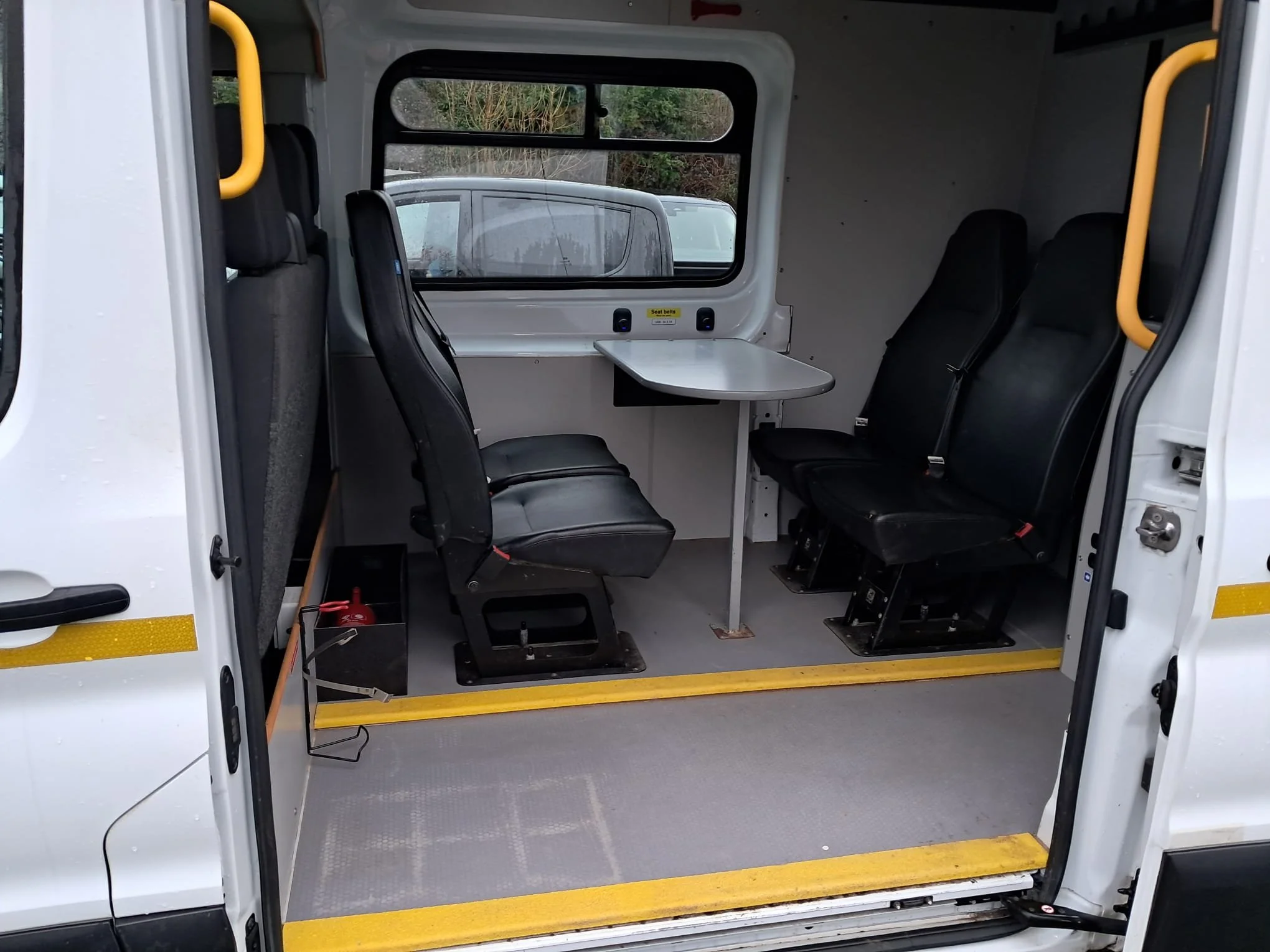 22 Ford Transit 350 130PS L3 H2 Mess Van interior table and seats