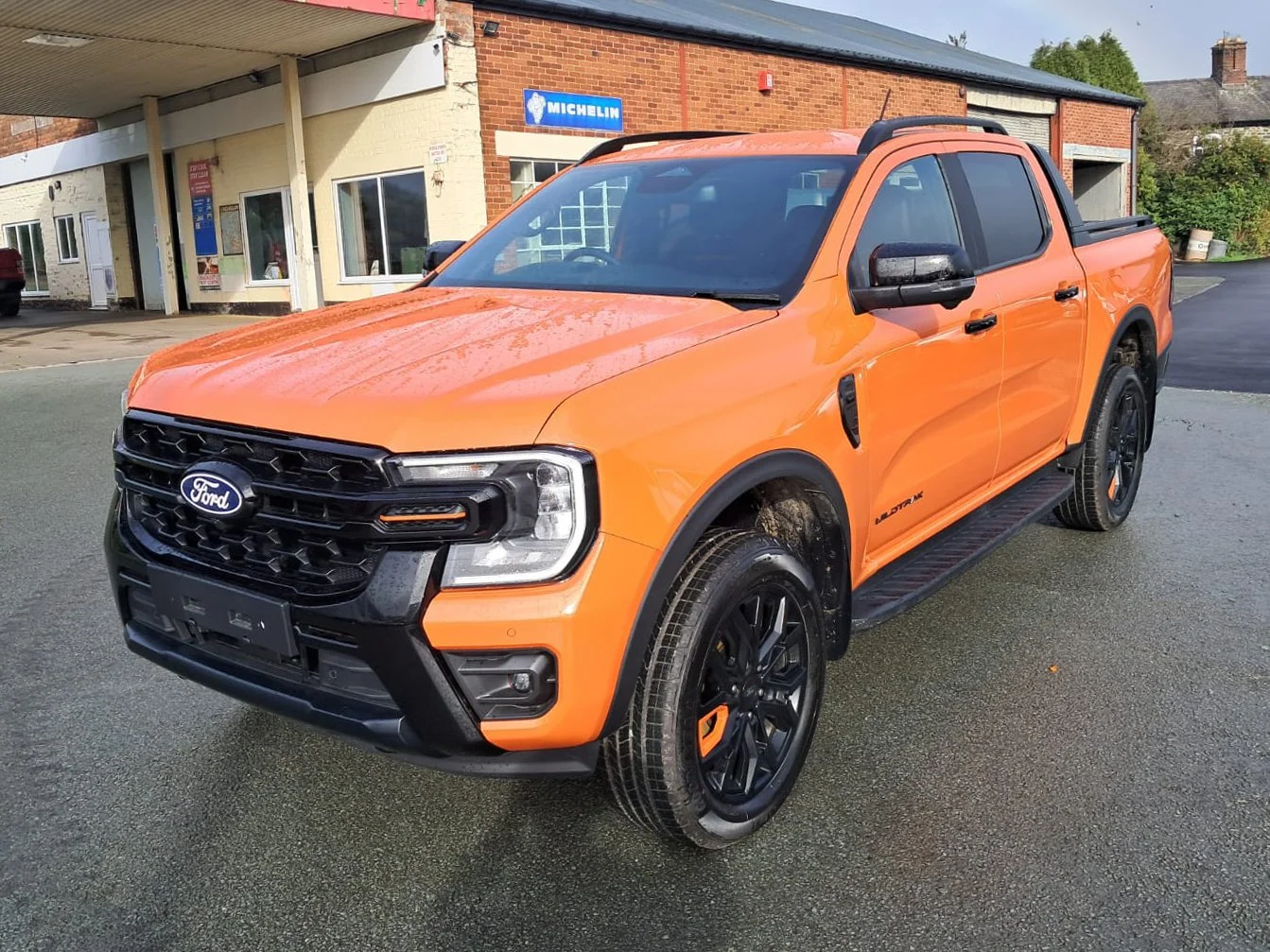 Orange 76 Ford Ranger Wildtrak V6 Auto  front passanger