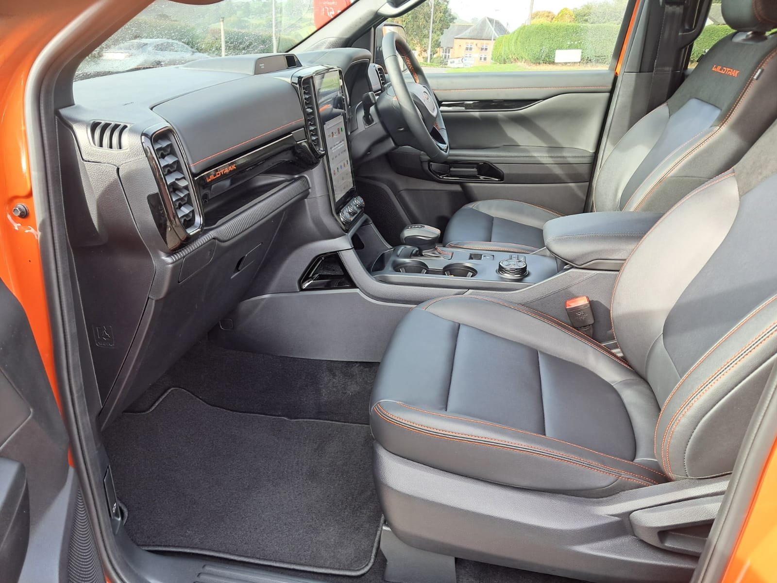 Orange 76 Ford Ranger Wildtrak V6 Auto front interior