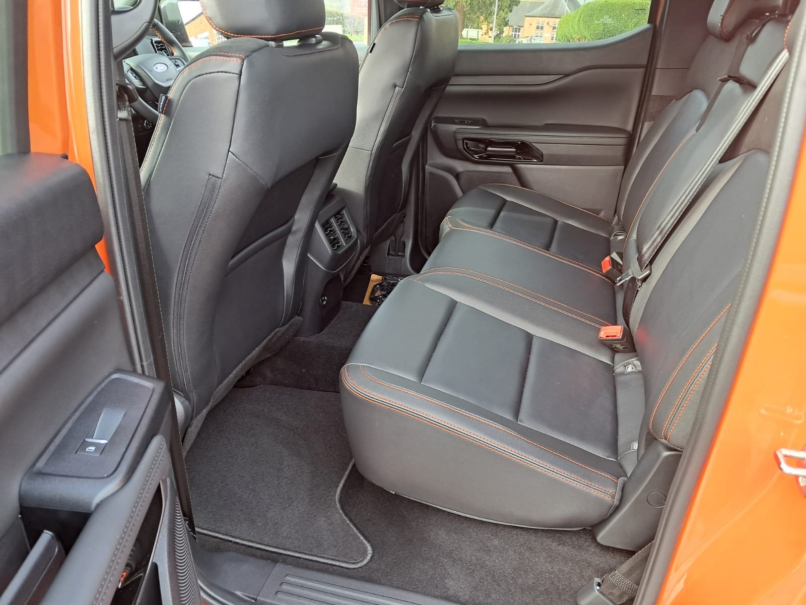 Orange 76 Ford Ranger Wildtrak V6 Auto rear interior