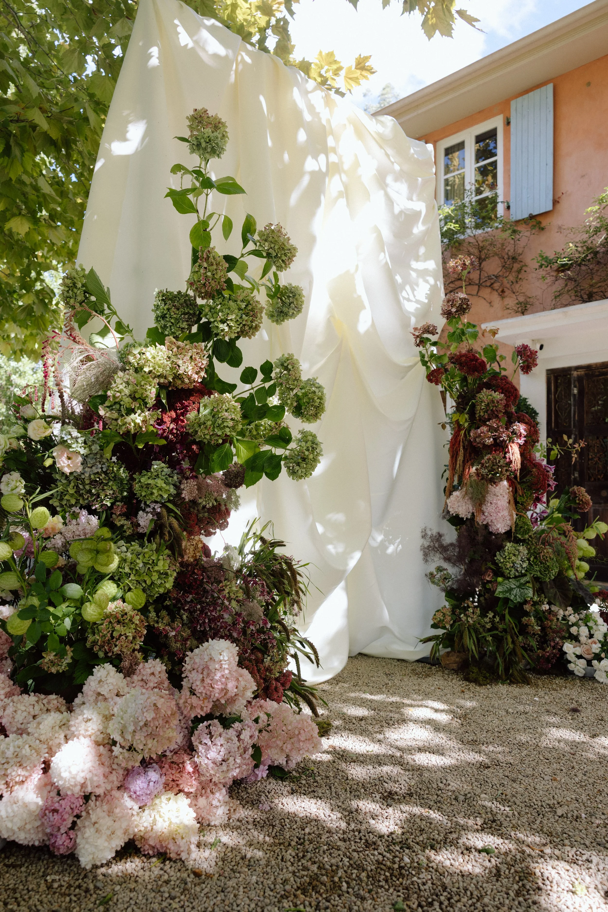 Ceremony floral arch at Redleaf Wollombi wedding, lush garden florals by The Naked Florist Hunter Valley