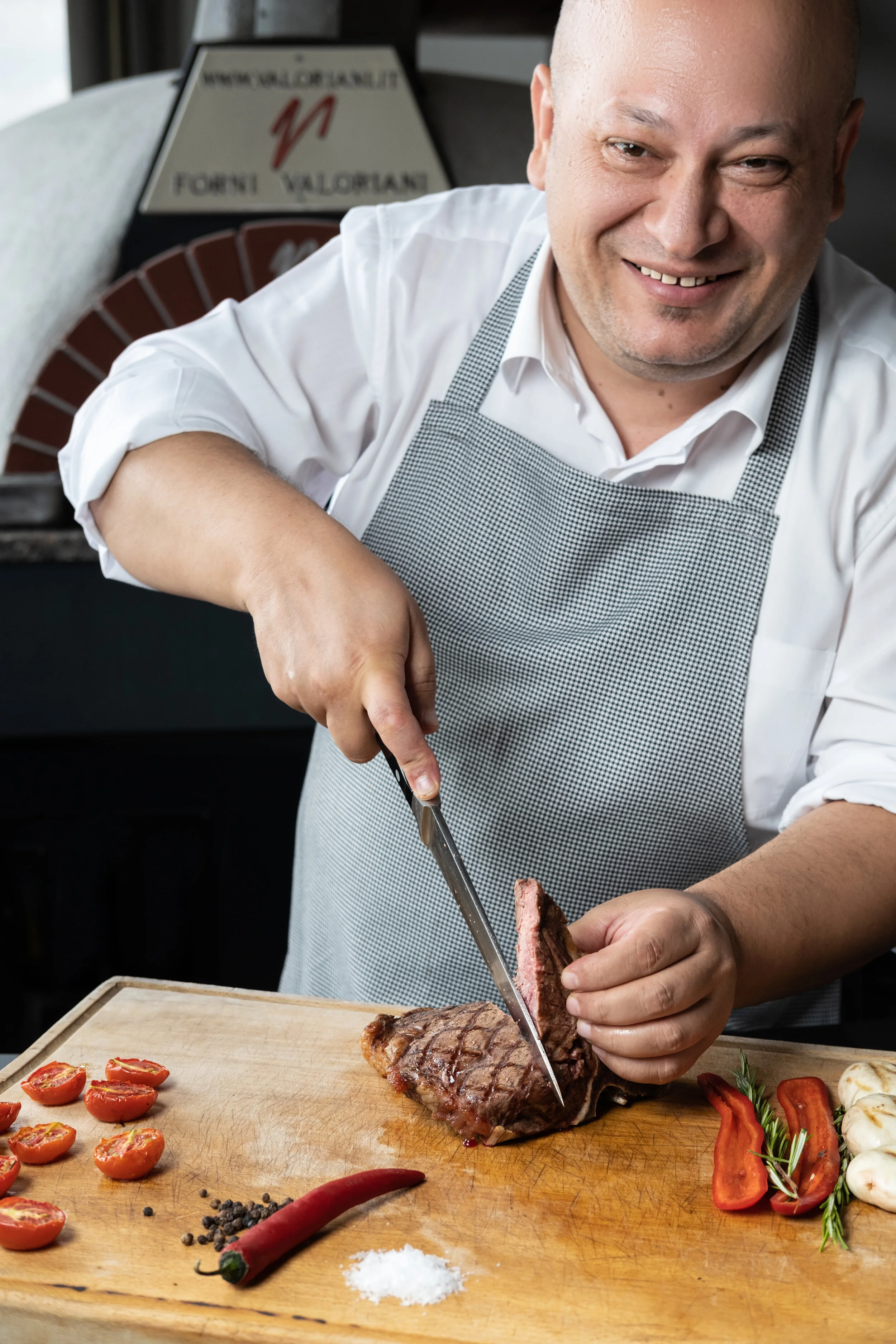 Hotel executive Chef slicing meat