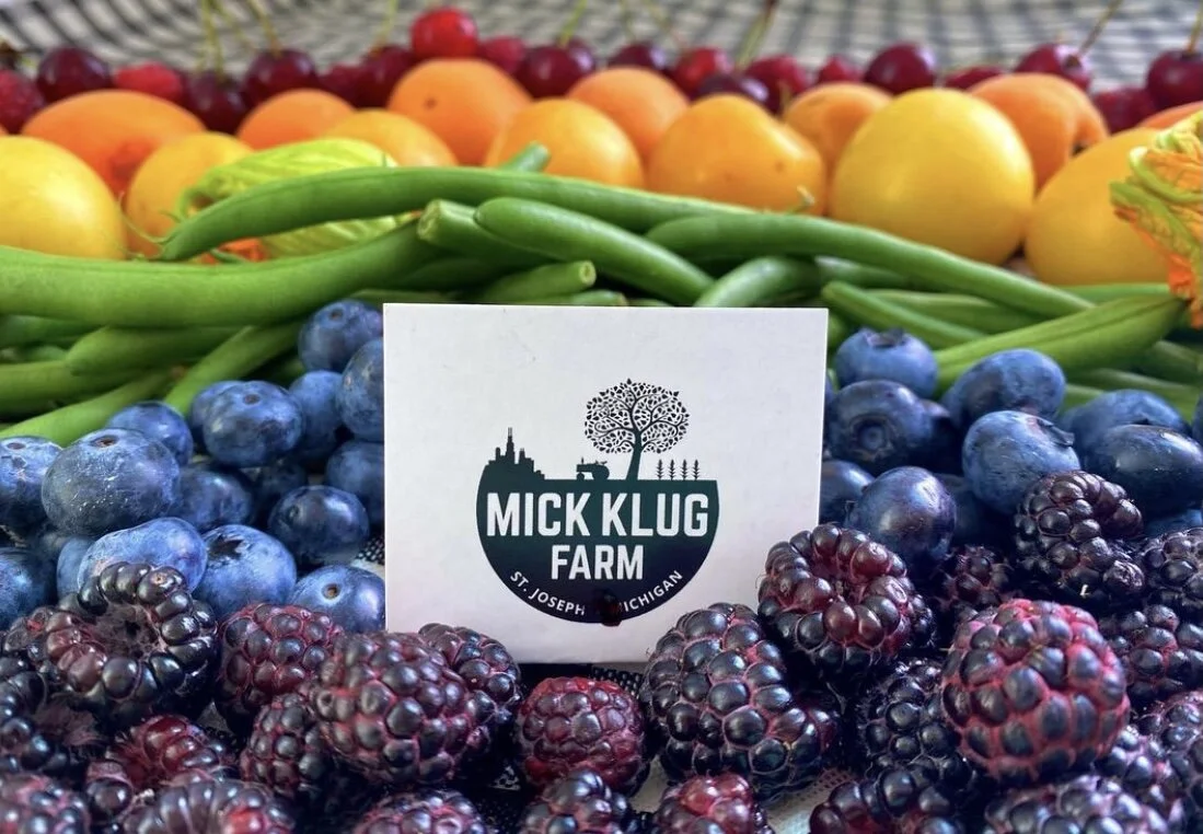 Fresh blueberries, blackberries, green beans, and various types of melons at Mick Klug Farm, St. Joseph, Michigan.