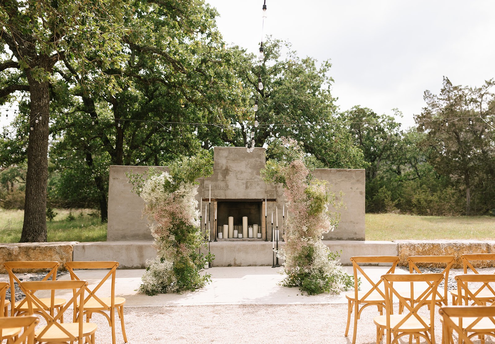 Fireside patio outdoor wedding ceremony in Texas Hill Country.
