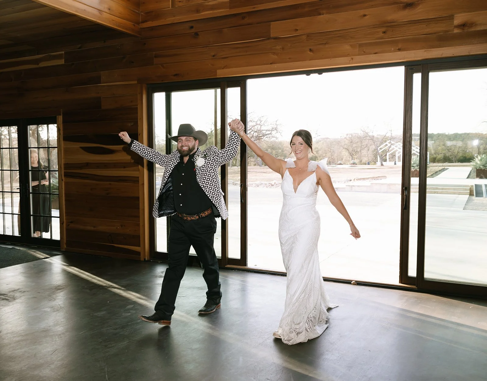 bride-and-groom-entrance-swallows-eve-venue.jpg