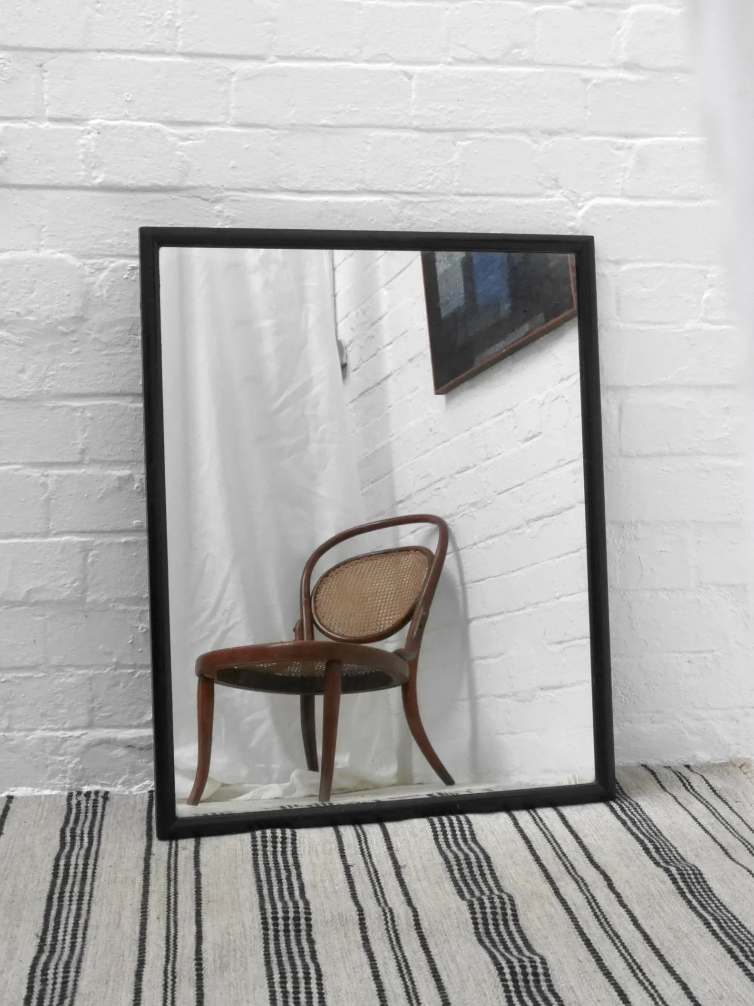 Edwardian ebonised shop mirror