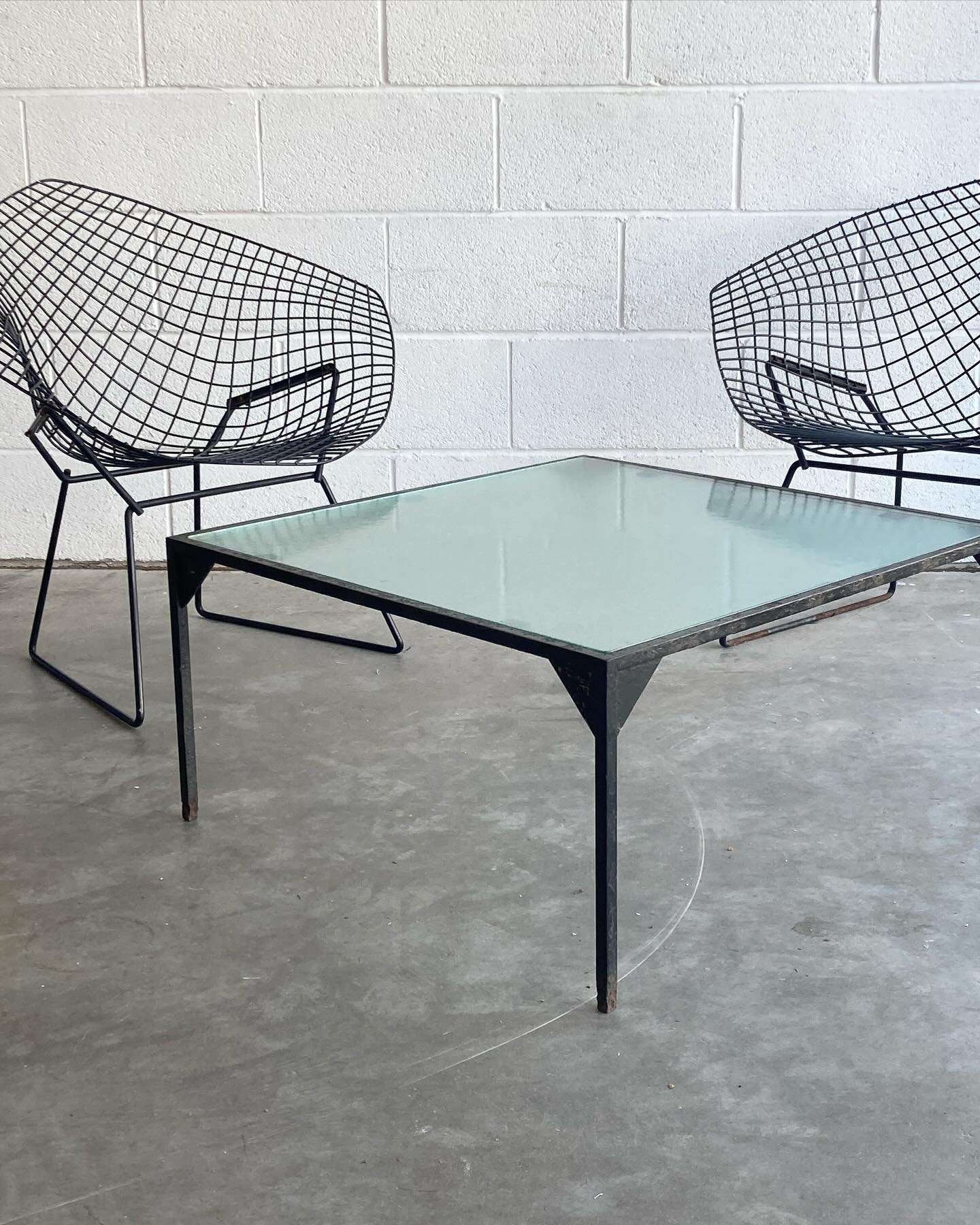 Iron and dappled glass garden table, 1950s. This came from the home of a well-known British architect. 

It&rsquo;s a raw and quite basic design, I suspect a one-off homemade build. There is lots of wear to the paint finish where it has spent years o