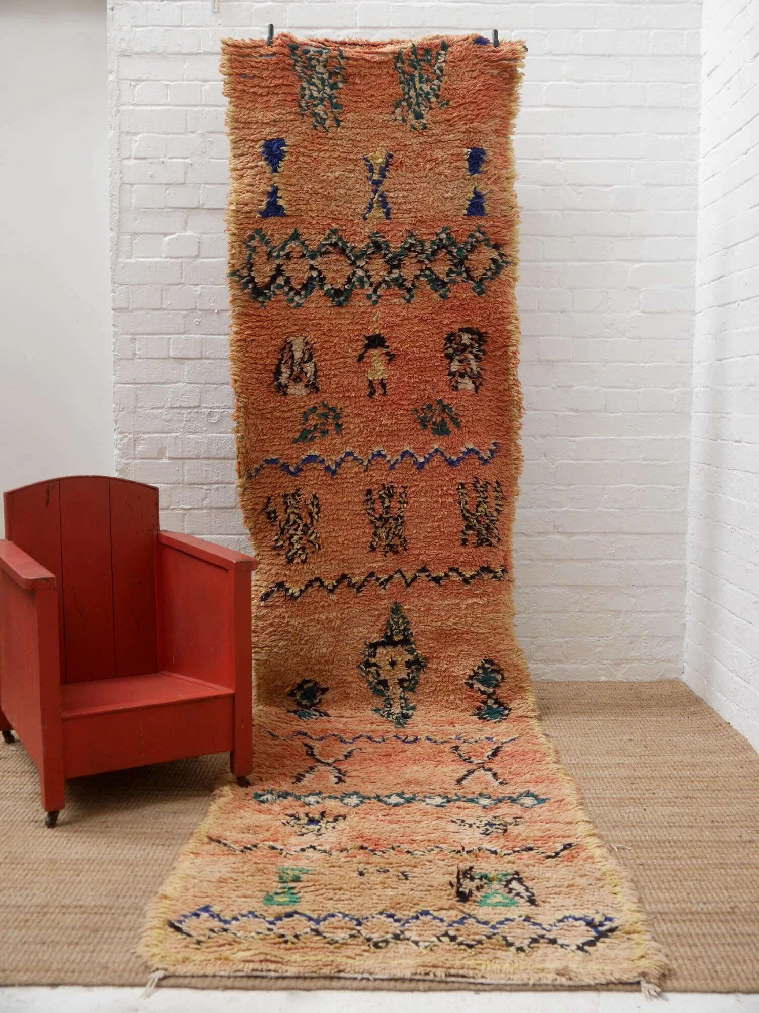 Perfect for someone with a very long corridor&hellip;3.8m long Moroccan runner rug in gorgeous soft peach/pink with motifs in green, blue, cream and black.

DM for more details or head to the website.