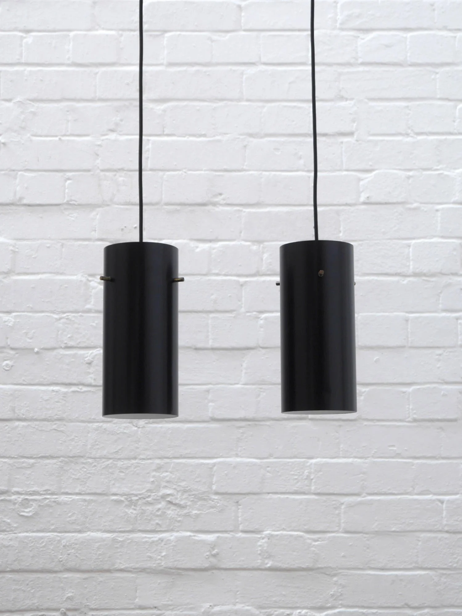 Pair of 1960s black pendant lights