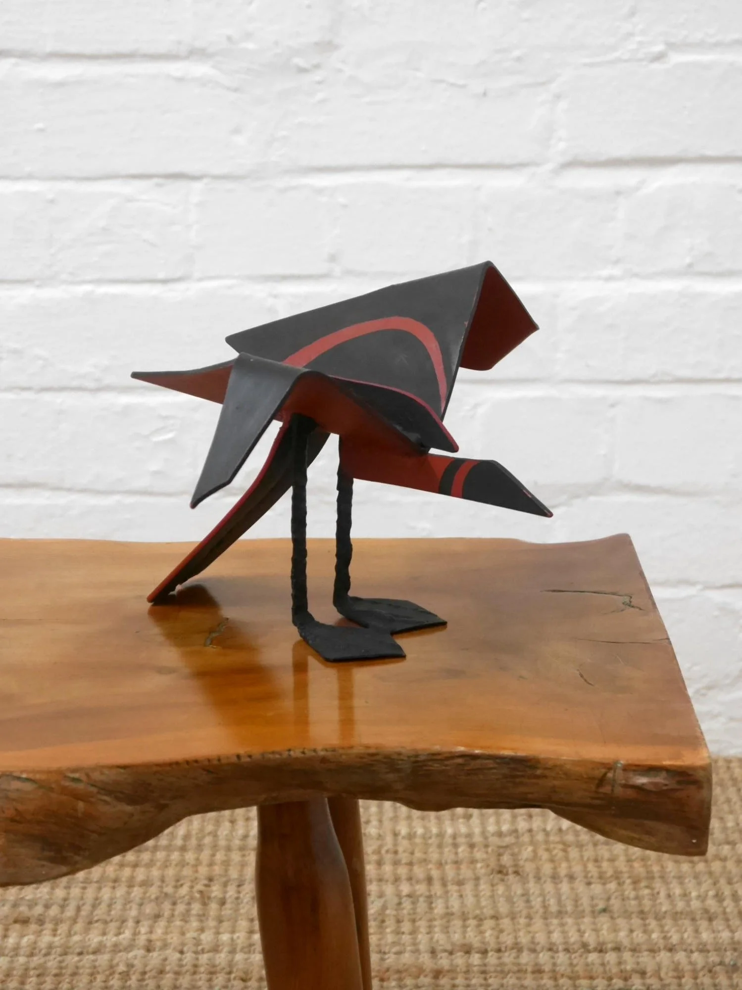 Metal bird sculpture by Lucy Wynne