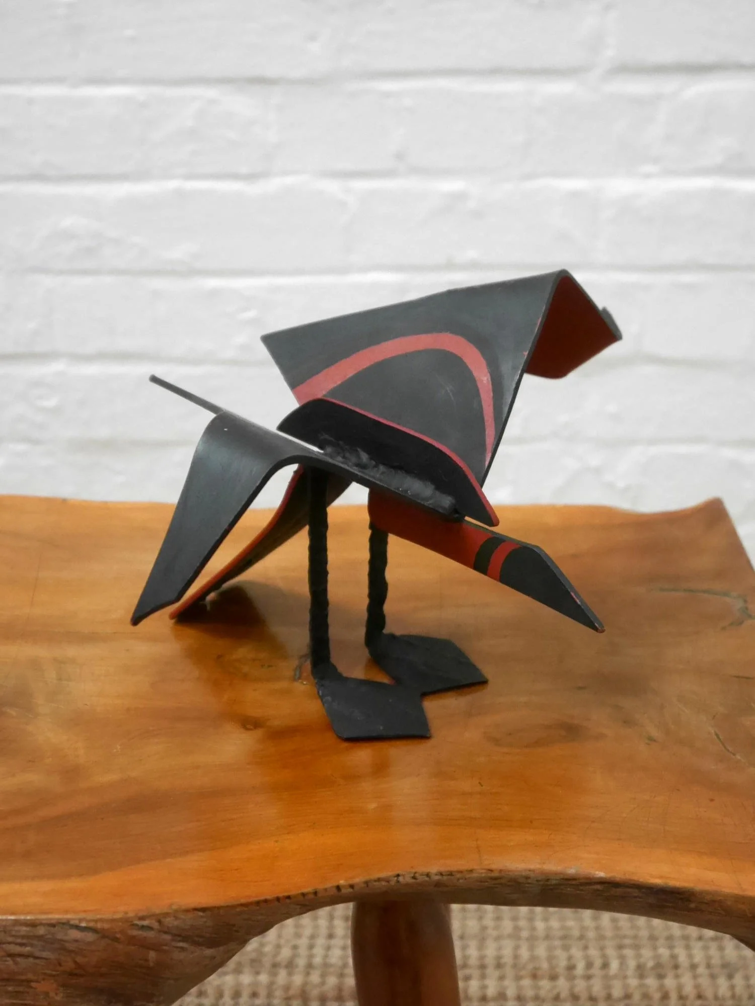 Metal bird sculpture by Lucy Wynne