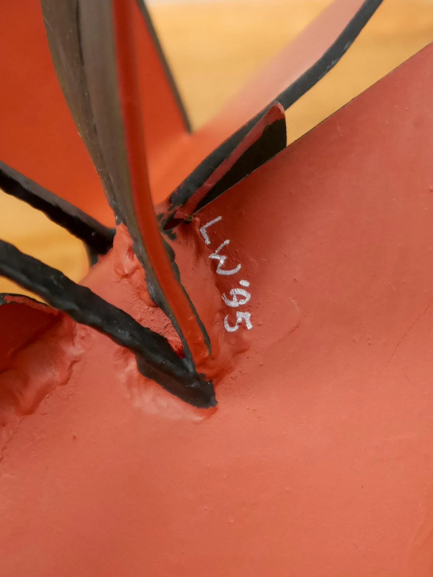 Metal bird sculpture by Lucy Wynne