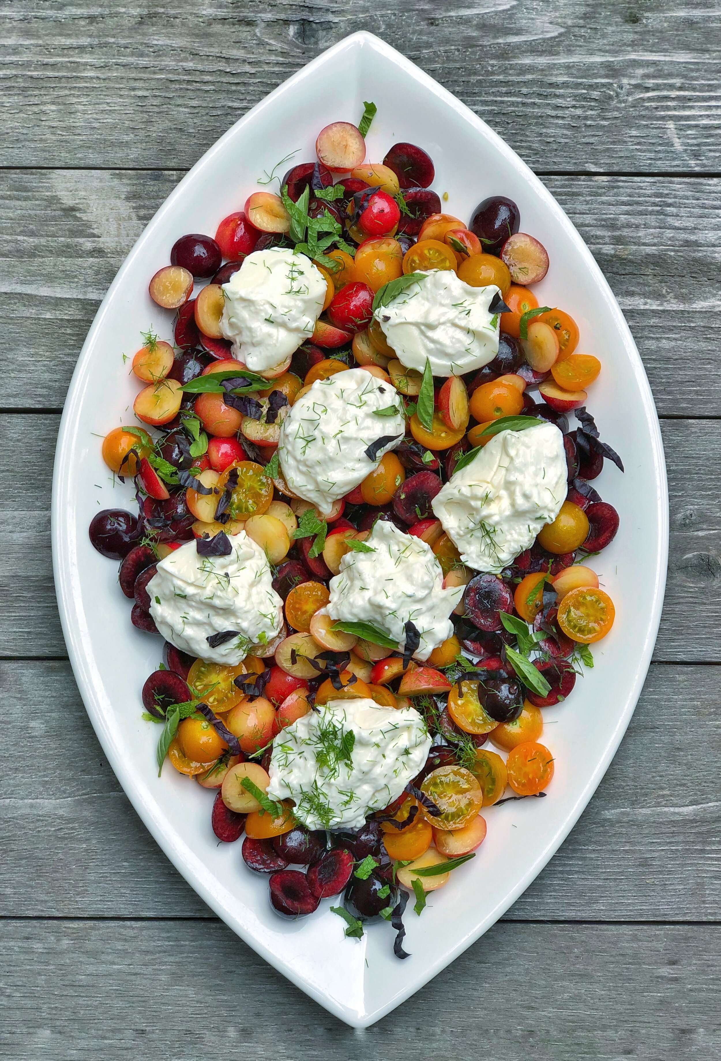 Heirloom cherry tomato and black cherry salad with burrata, aged balsamic and fresh mint