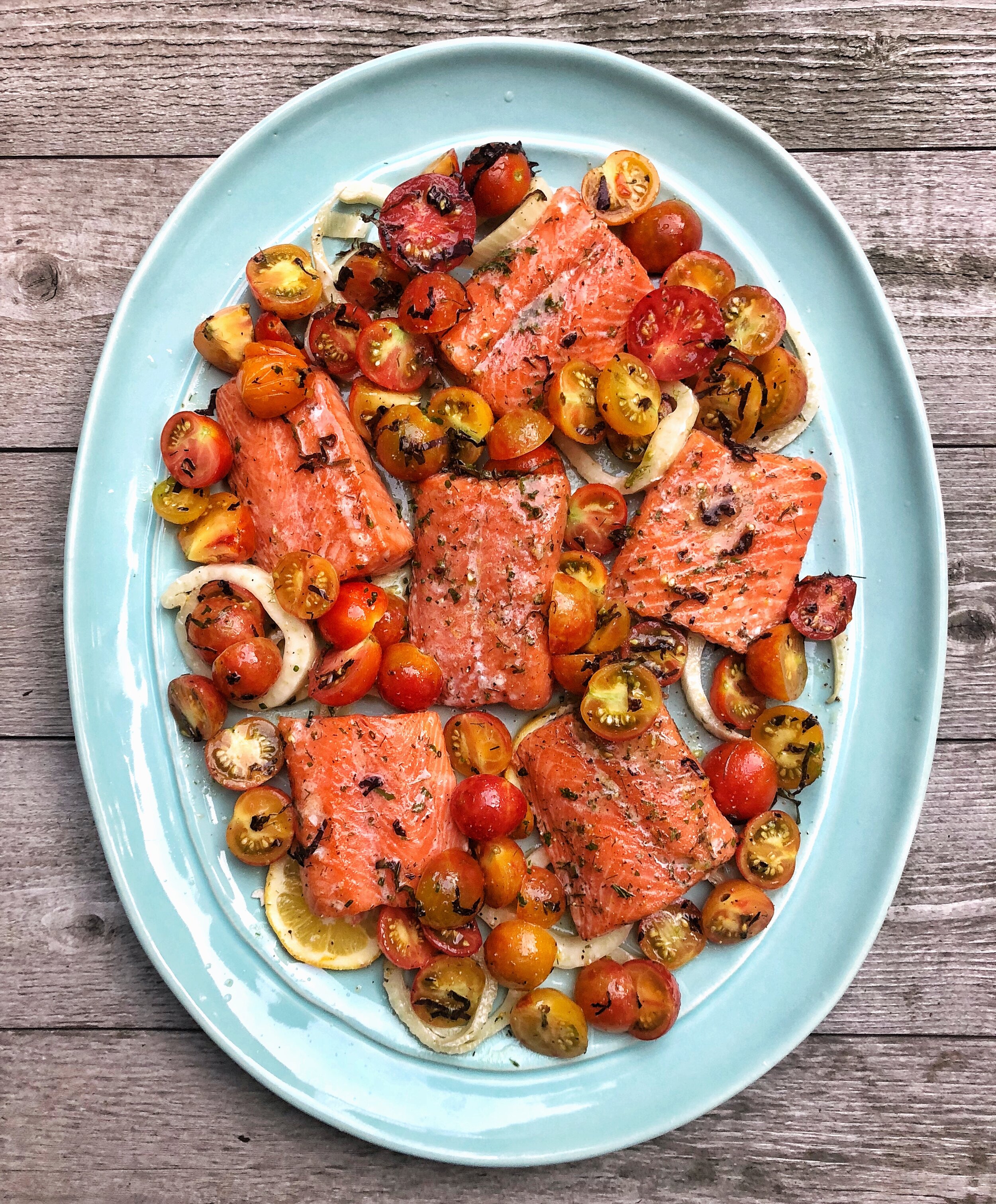 Wild salmon with a fennel and tomato salad and purple basil