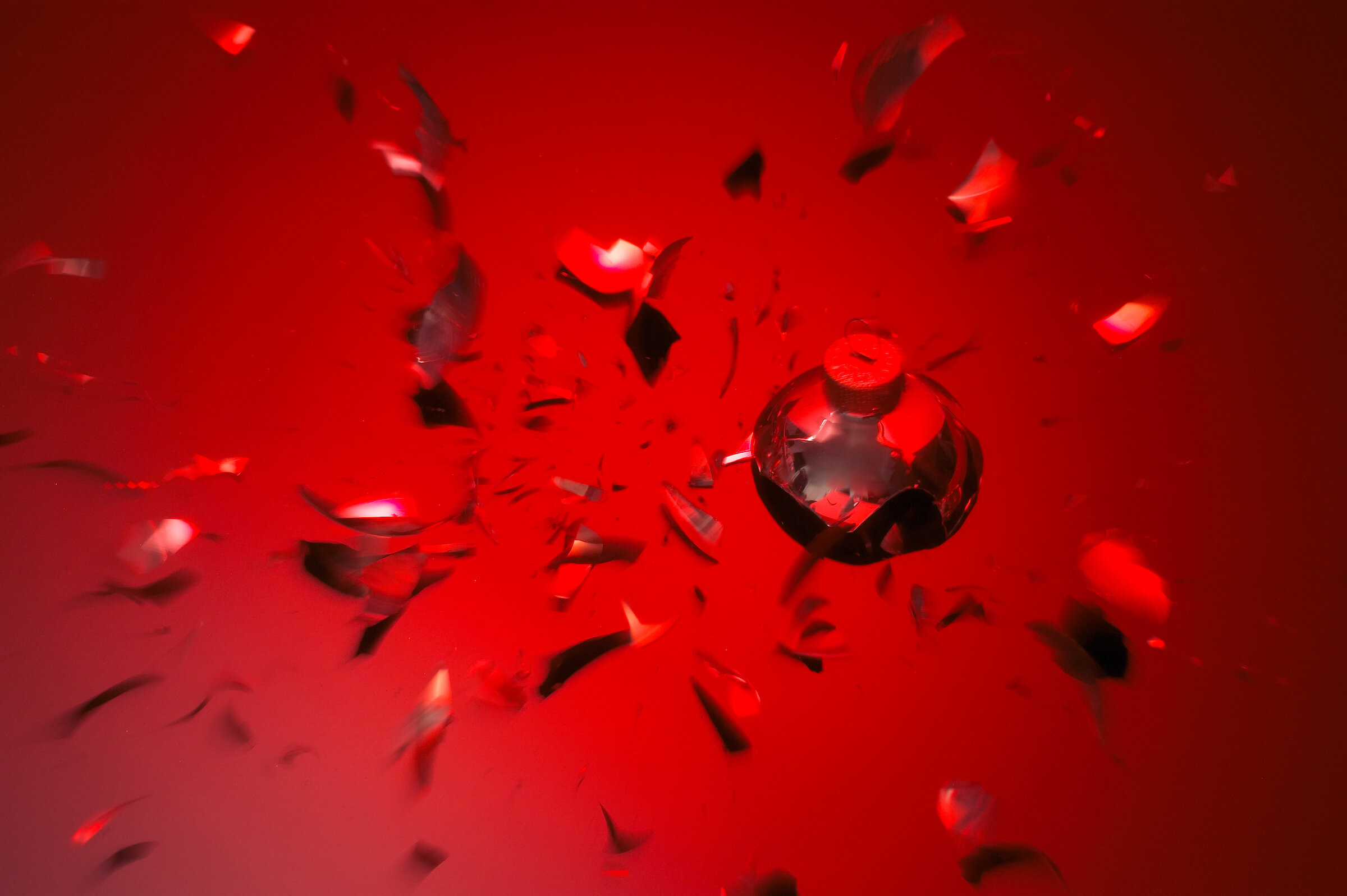 Red glass ball smashed.jpg