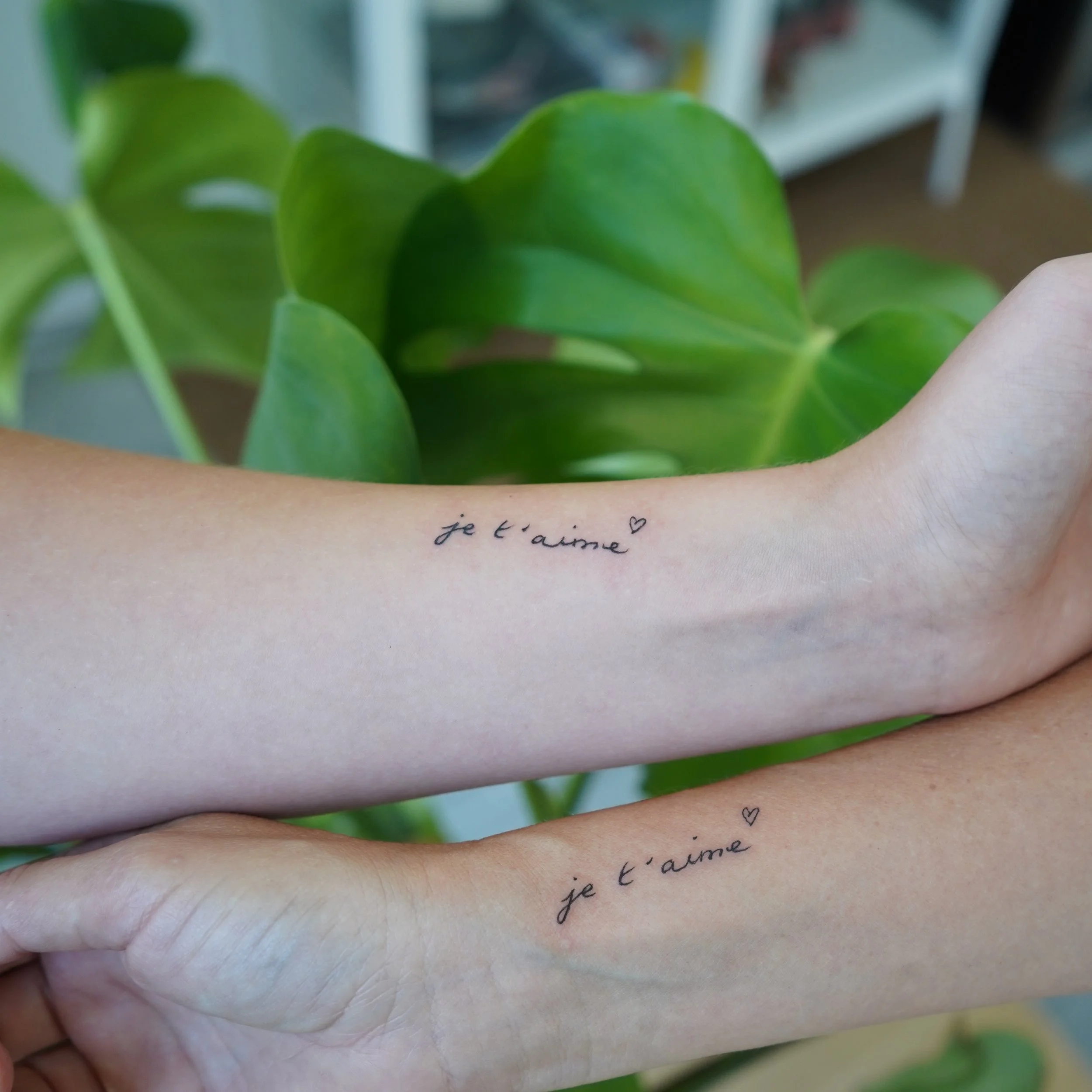 Mother-daughter tattoos with my best girl! It&rsquo;s my husband&rsquo;s handwriting, and my son drew the heart. 🥰 Thank you for an unforgettable visit, @jenterritotattoos &amp; @morningglorytattoos!