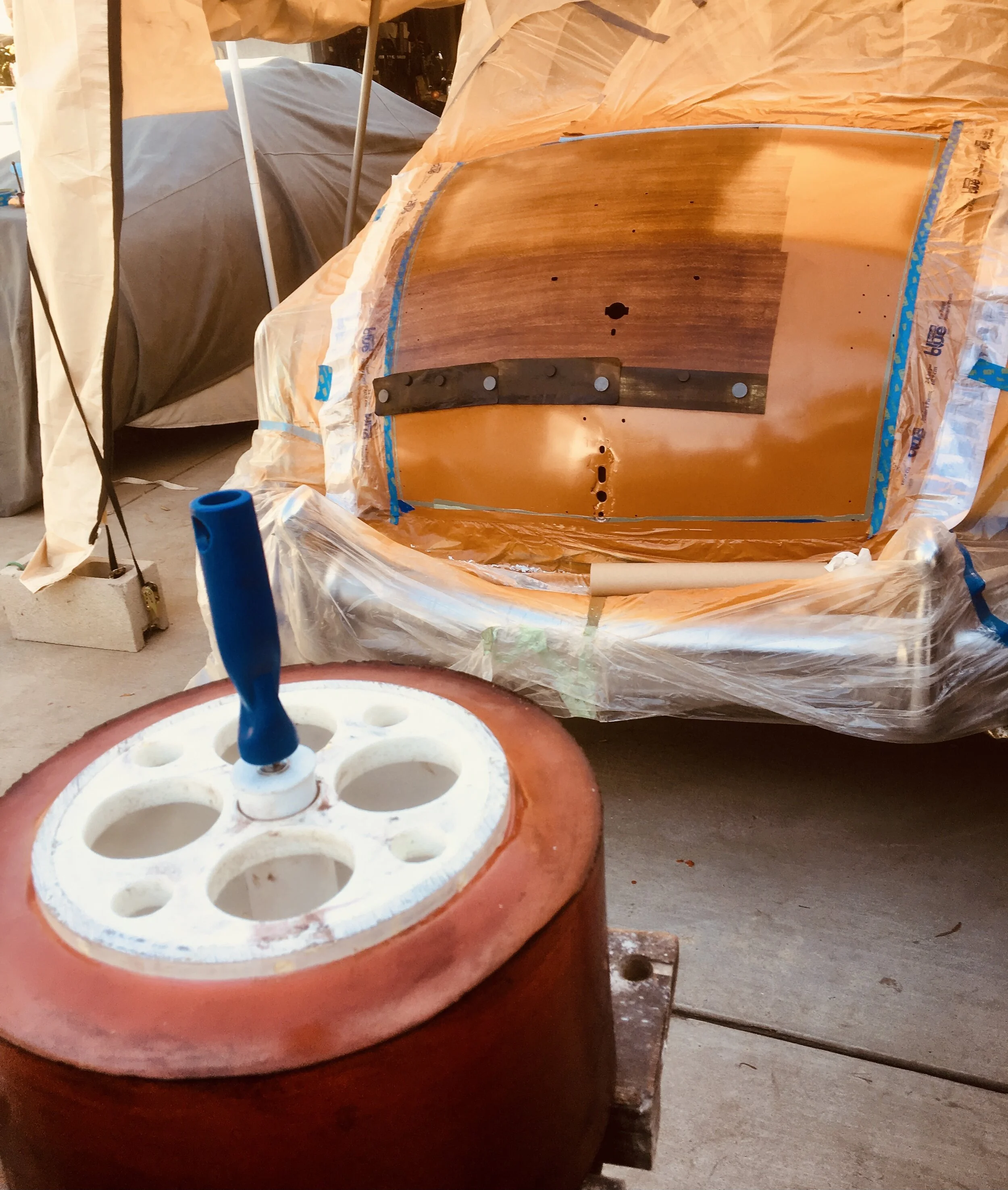 Wood frames were fashions from Ash and Mahogany grain applied to the panels