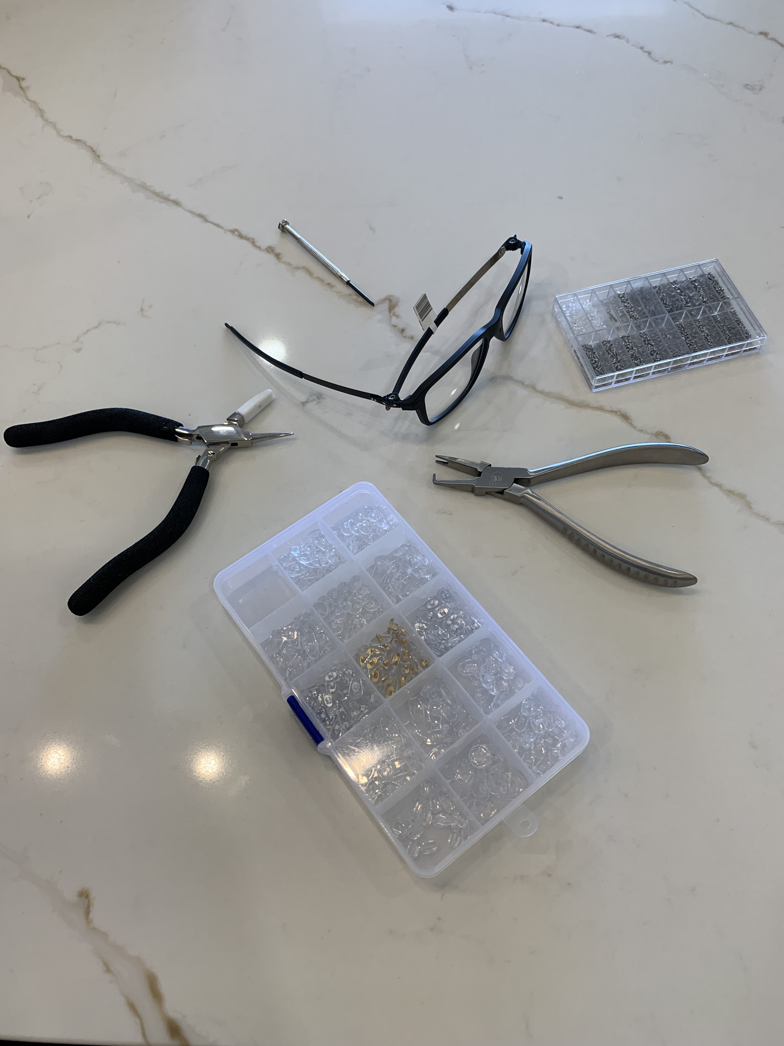 Tools, screws, and nosepads for adjusting and fixing frames