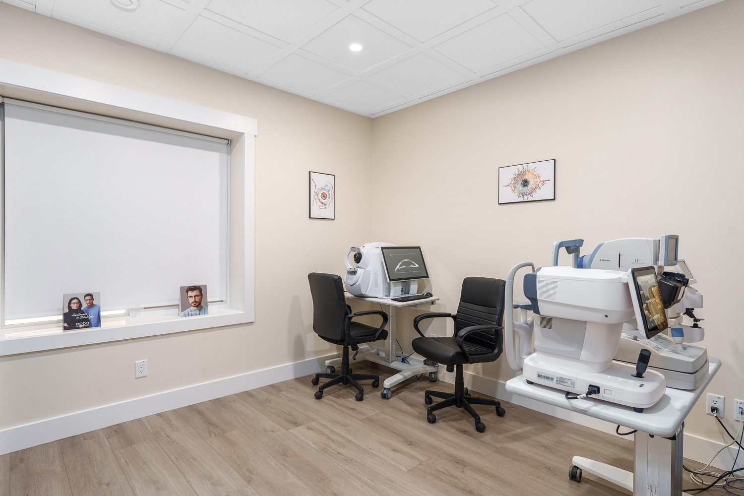 A clinical room filled with high tech machines for testing, diagnosing, and managing ocular disease