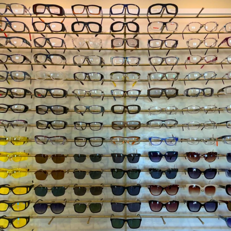Custom-fabricated frame display with a variety of safety glasses 
