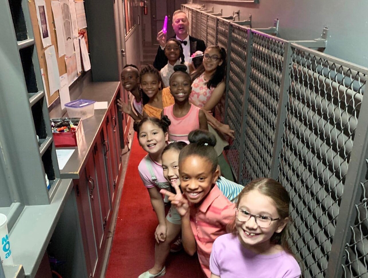 CCC singers backstage on opening night of Lyric Opera's production of Dead Man Walking.
